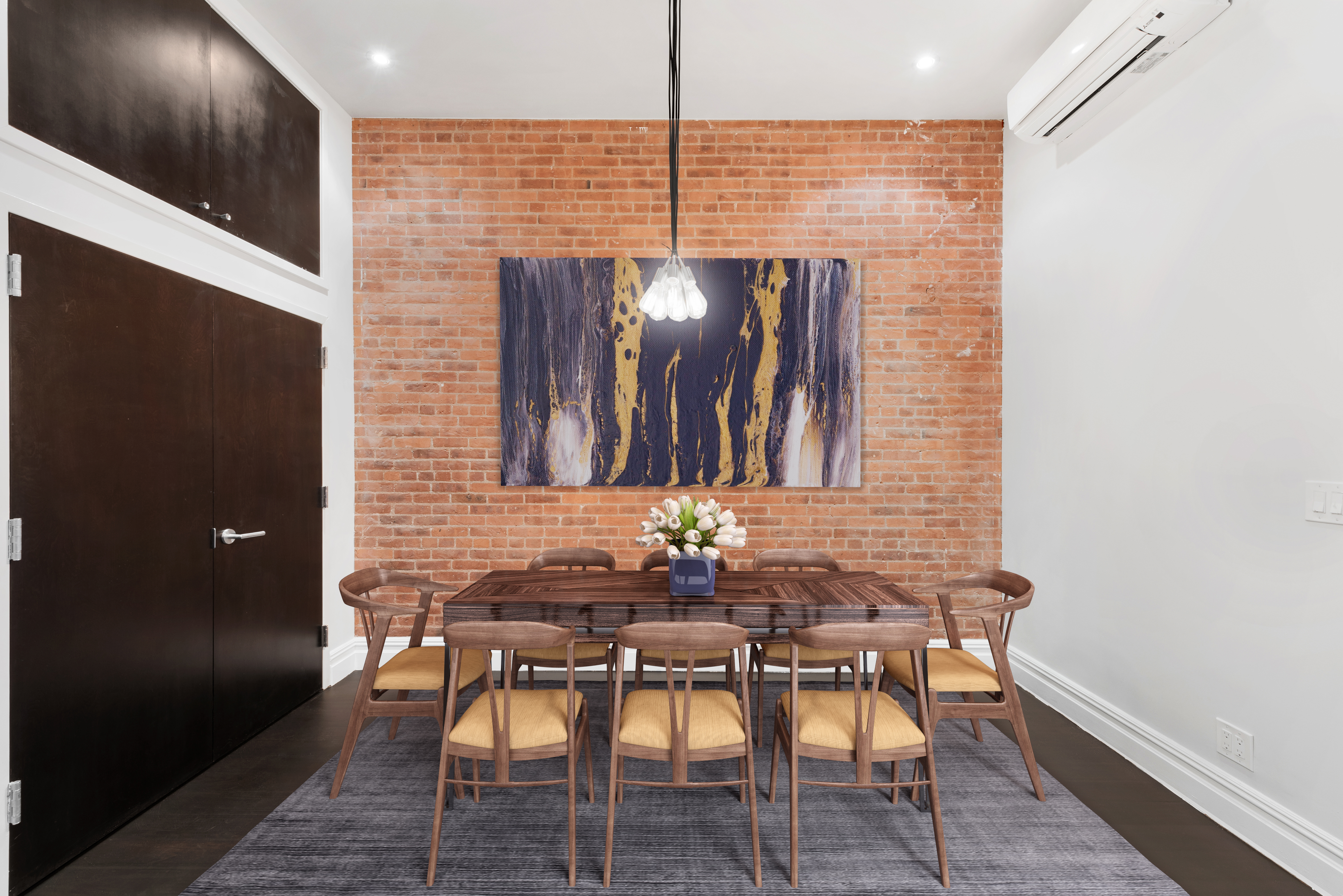 175 Franklin Street, Unit LOFT Manhattan, NY 10013 - Photo 3 of 12 a dining room with furniture and wooden floor