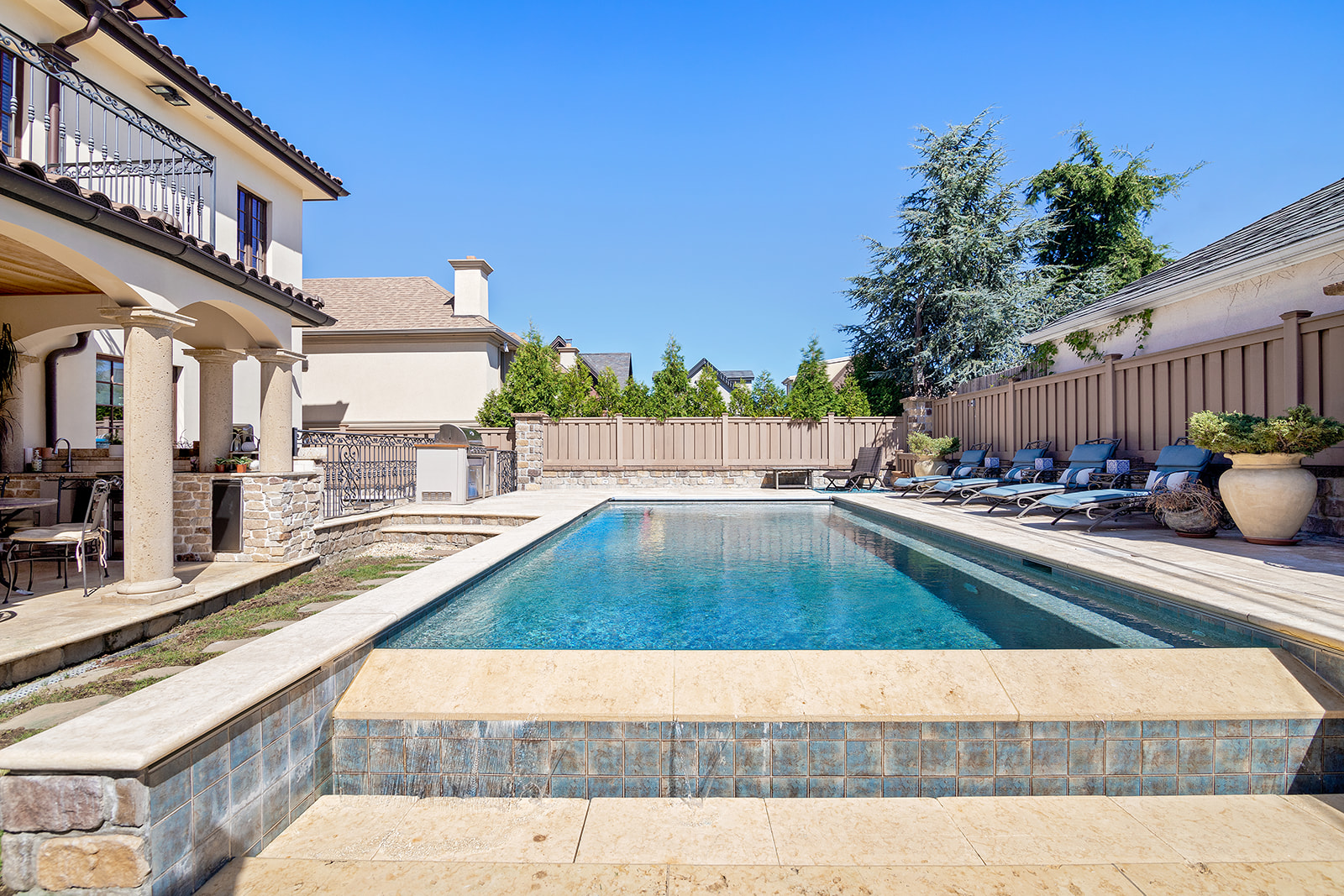 7921 Narrows Avenue Brooklyn, NY 11209 - Photo 38 of 42 a view of a swimming pool with a lounge chair