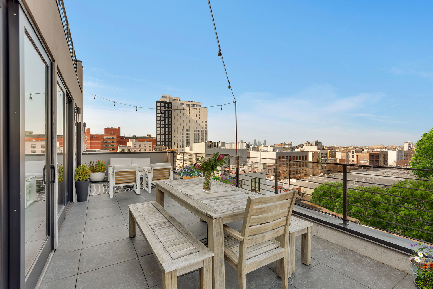 267 Evergreen Avenue, Unit PH Brooklyn, NY 11221 - Photo 5 of 19 a view of a terrace with seating space