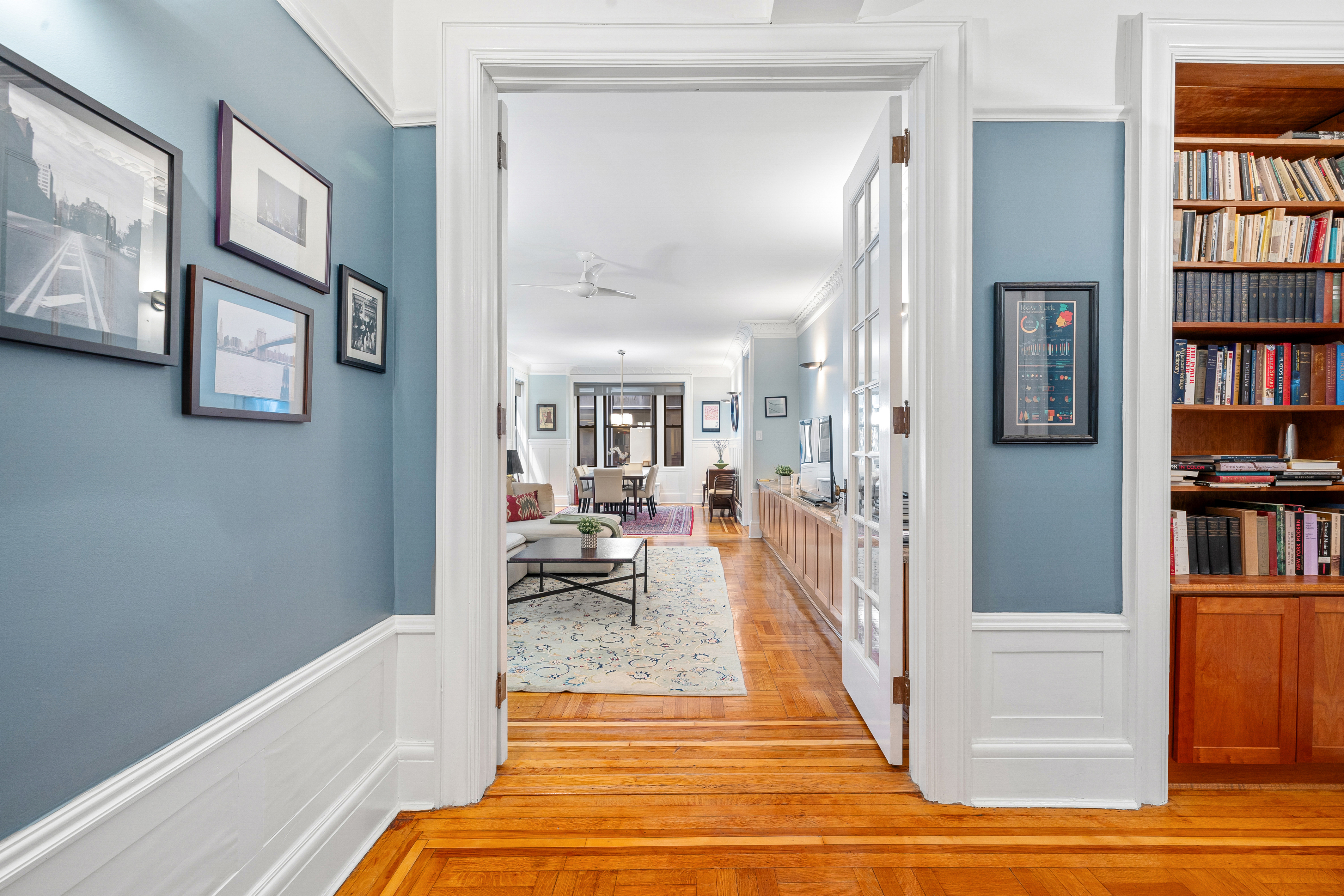 200 West 54th Street, Unit 9G Manhattan, NY 10019 - Photo 2 of 17 a view of a living room and workspace