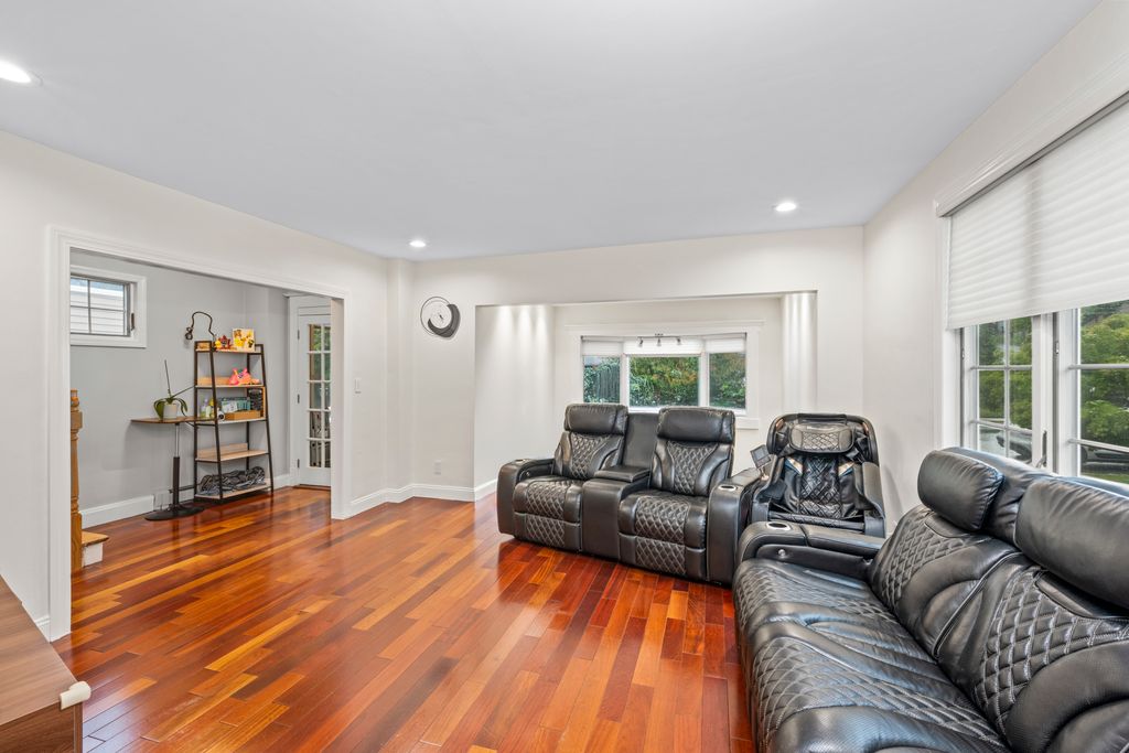 79 Sparkill Avenue Staten Island, NY 10304 - Photo 7 of 32 a living room with furniture and a wooden floor