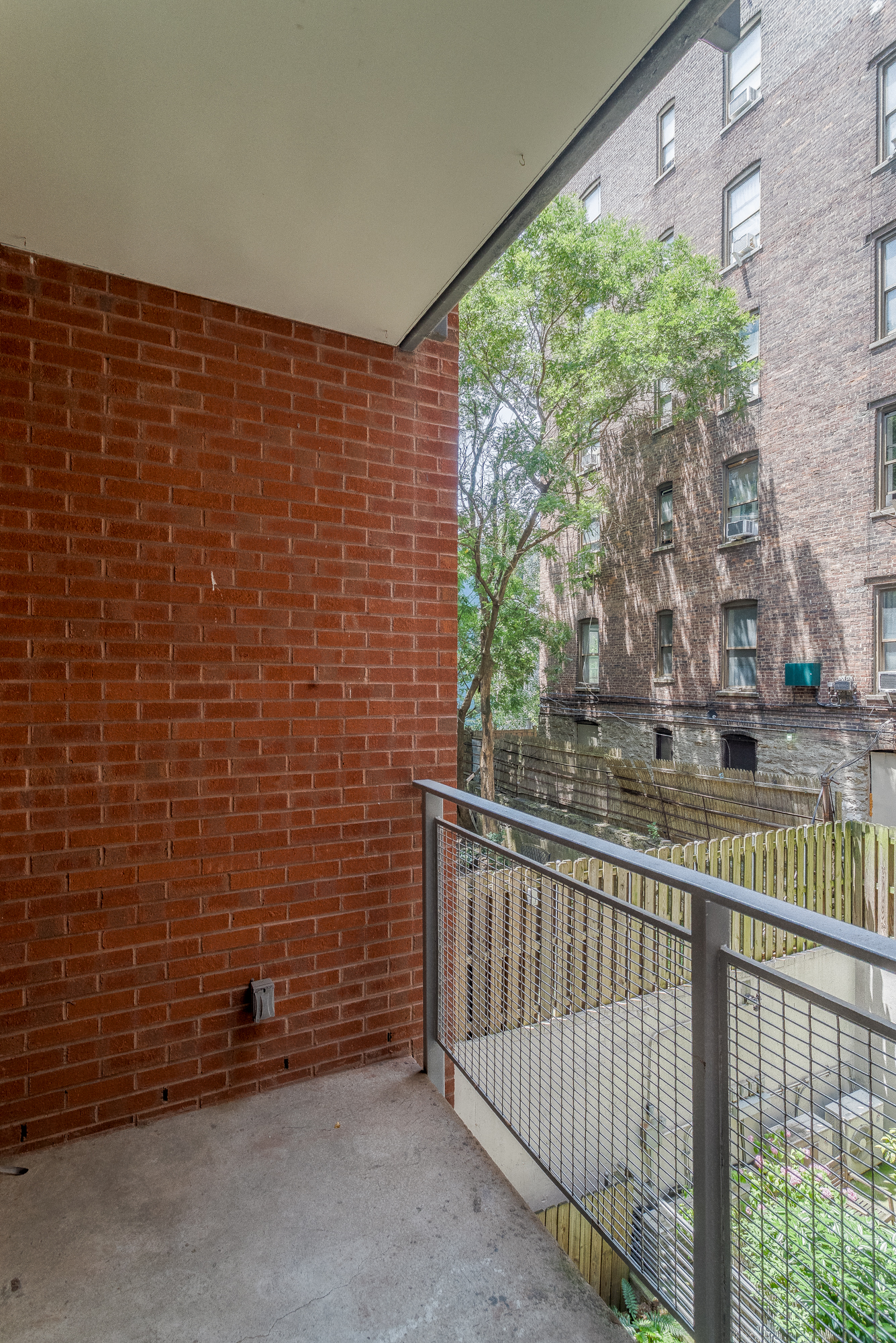 753 St Nicholas Avenue, Unit 2B Manhattan, NY 10031 - Photo 8 of 10 a view of a balcony with an outdoor space