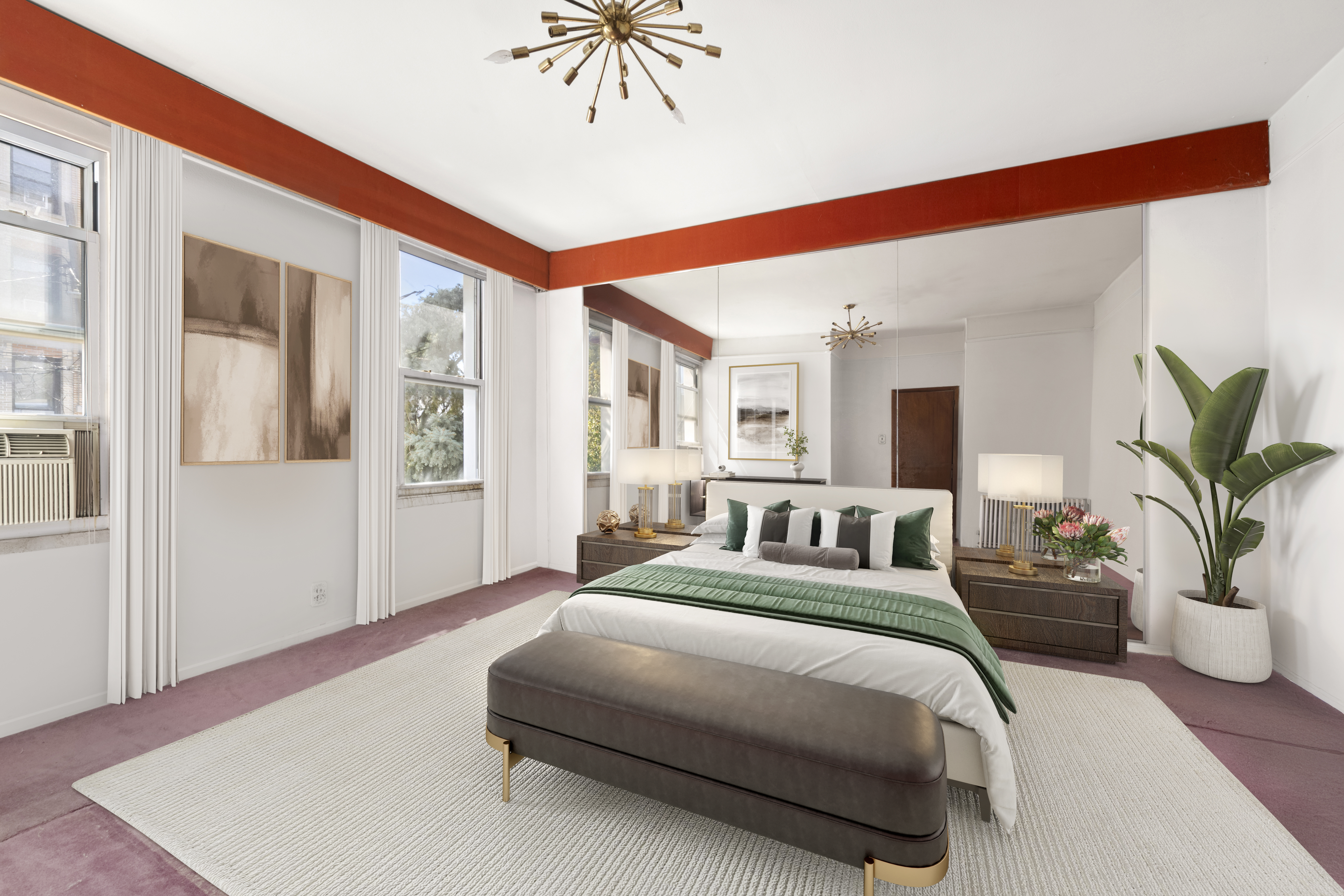 37-34 28th Street Queens, NY 11101 - Photo 10 of 17 a spacious bedroom with a large bed a potted plant and attached