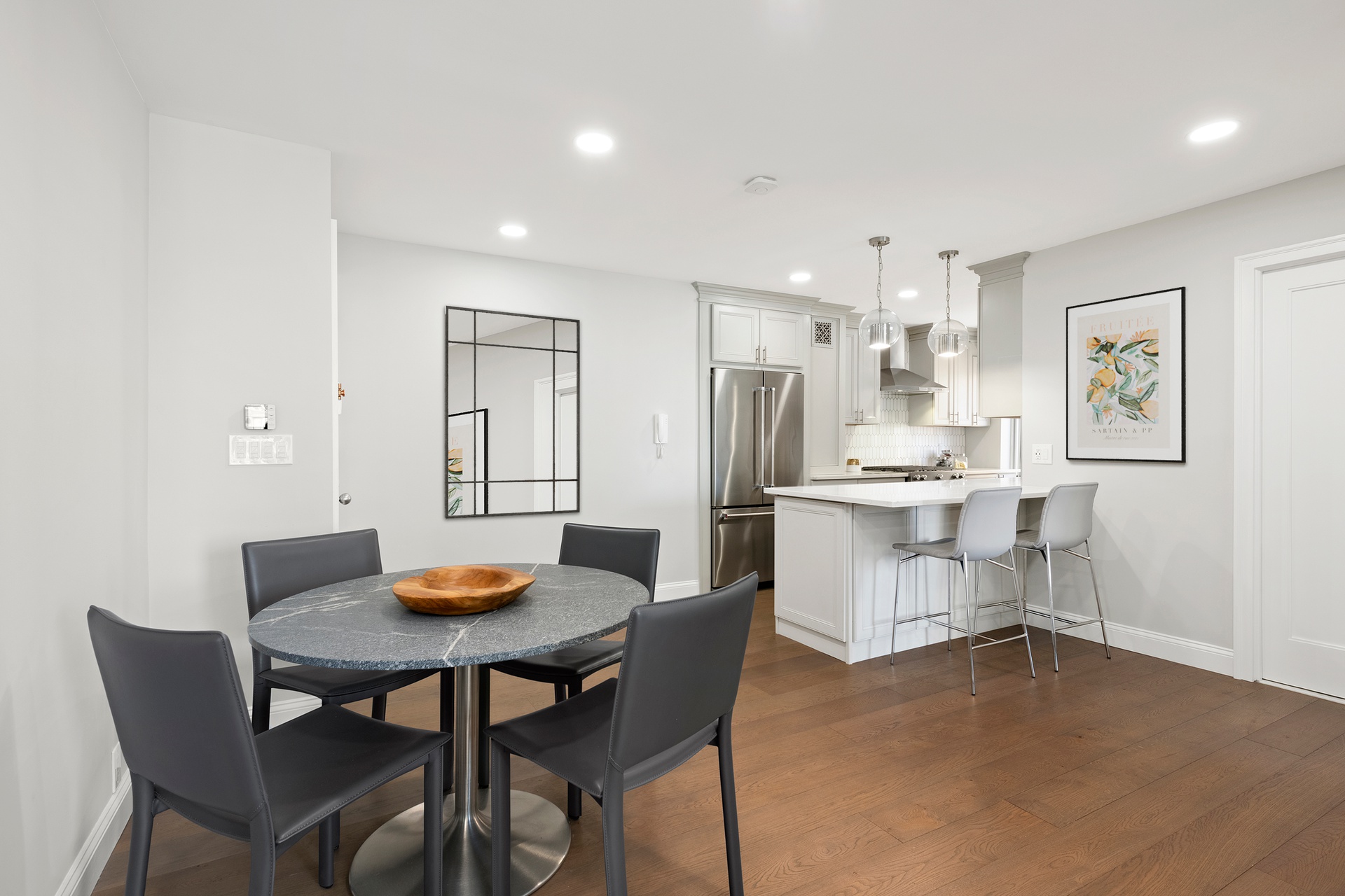 420 East 58th Street, Unit 14B Manhattan, NY 10022 - Photo 3 of 10 a view of a dining room with furniture and window