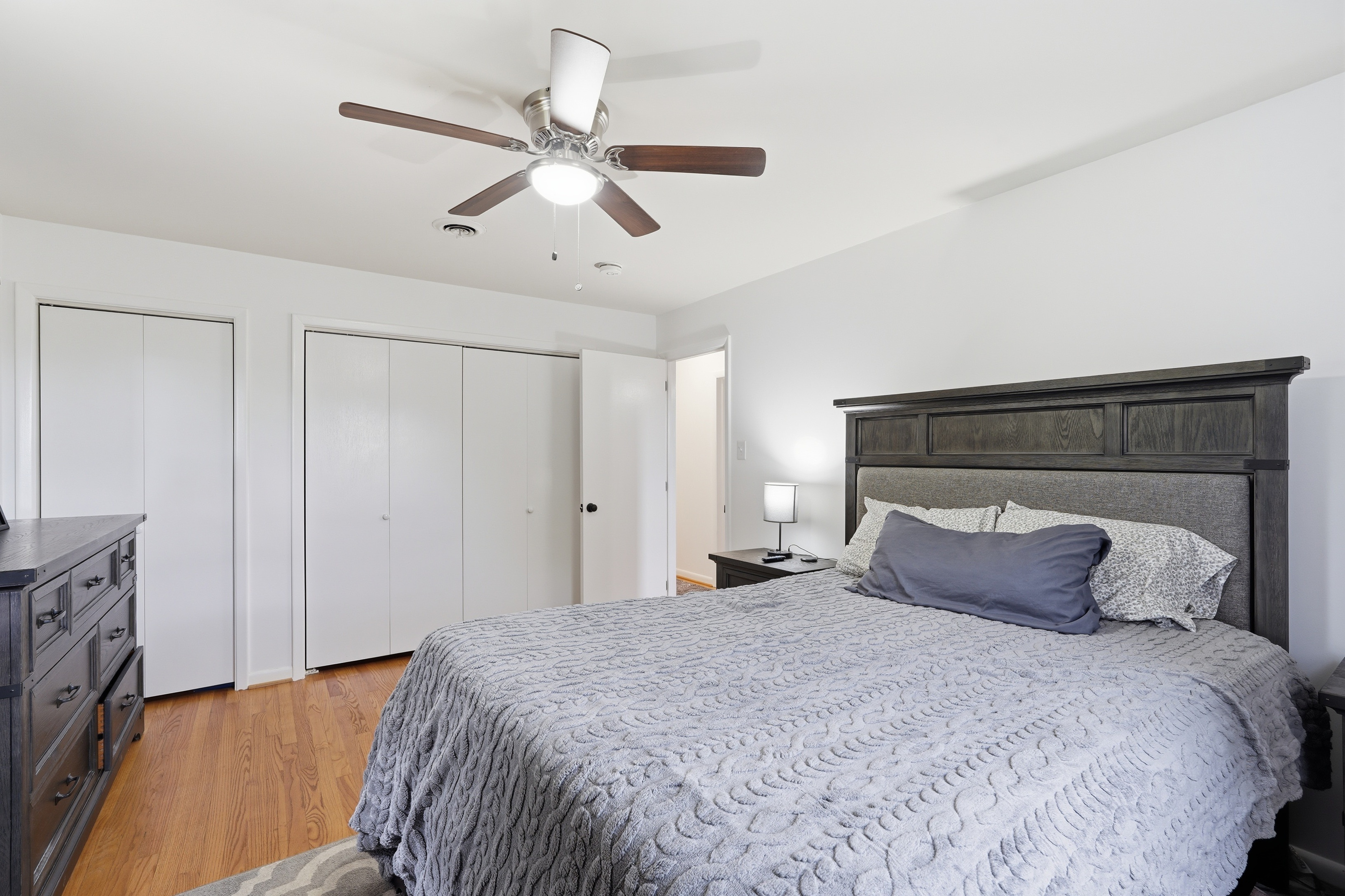 7717 McKaig Road Frederick, MD 21701 - Photo 21 of 53 a bedroom with a bed and a ceiling fan