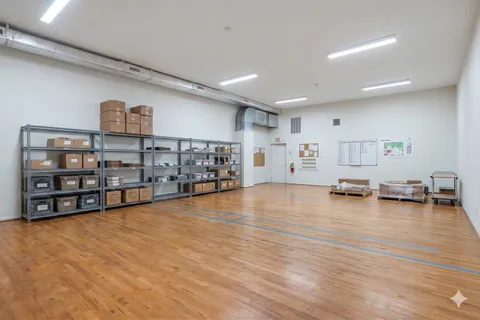 a view of a livingroom with wooden floor