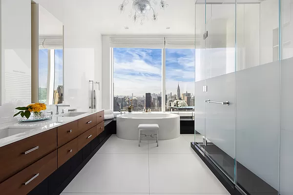 252 East 57th Street, Unit 62B Manhattan, NY 10022 - Photo 7 of 15 a large white kitchen with a large window