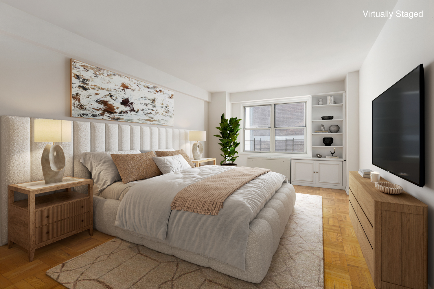 136 East 56th Street, Unit 9J Manhattan, NY 10022 - Photo 3 of 14 a bedroom with a large bed and a flat screen tv