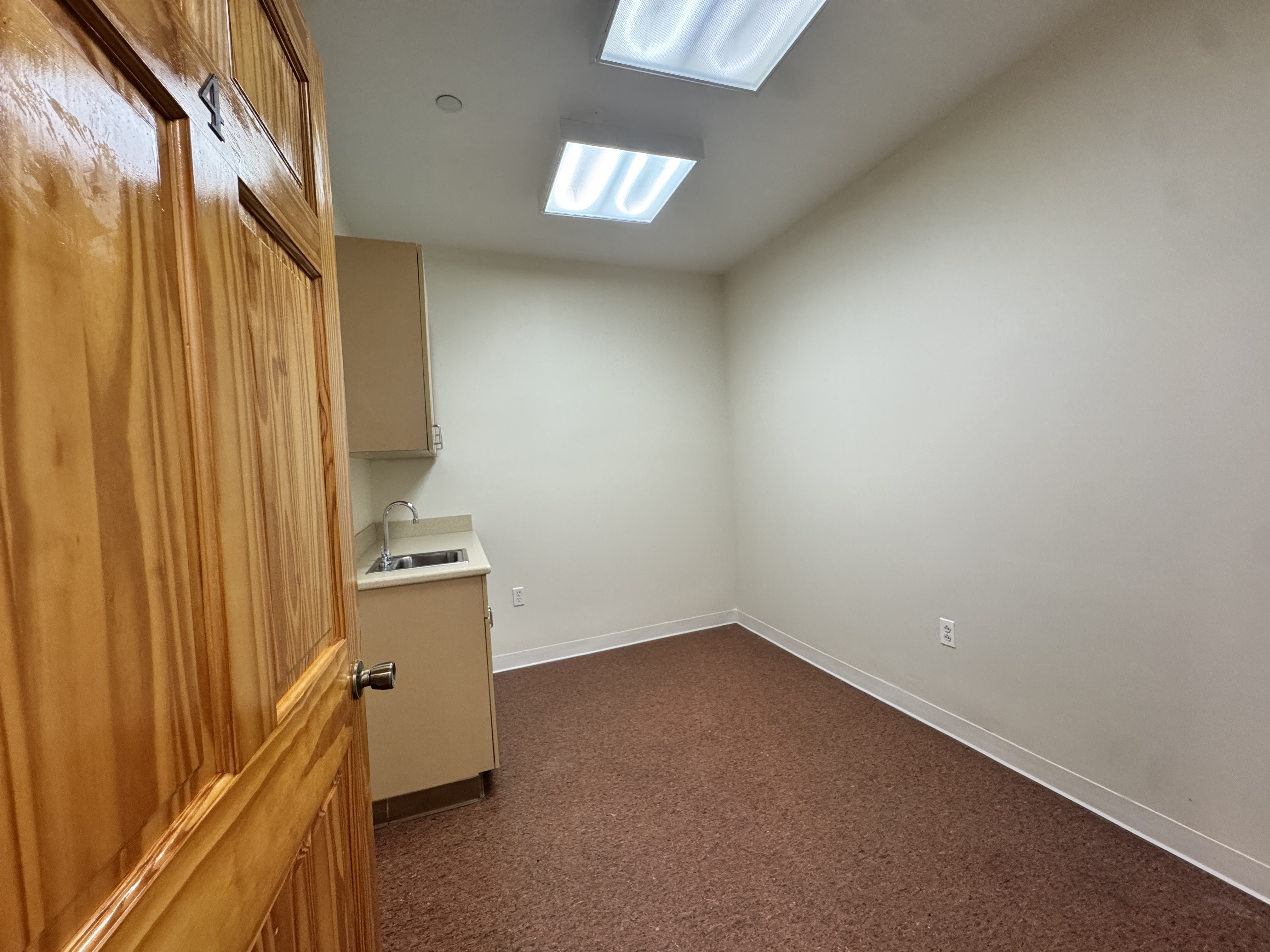 406 15th Street, Unit M1 Brooklyn, NY 11215 - Photo 6 of 19 a view of an empty room and window
