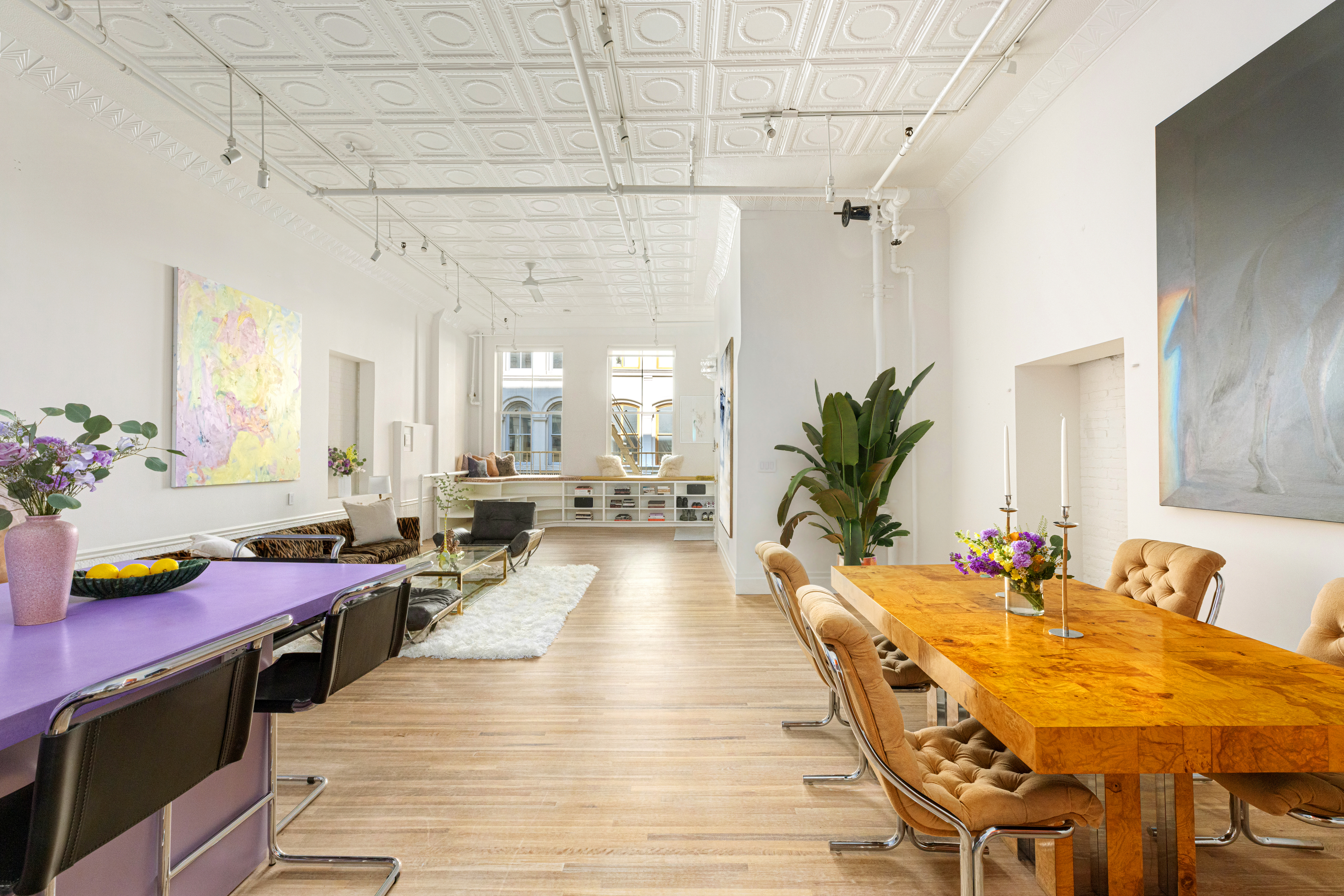 a very nice looking dining room with a table and chairs