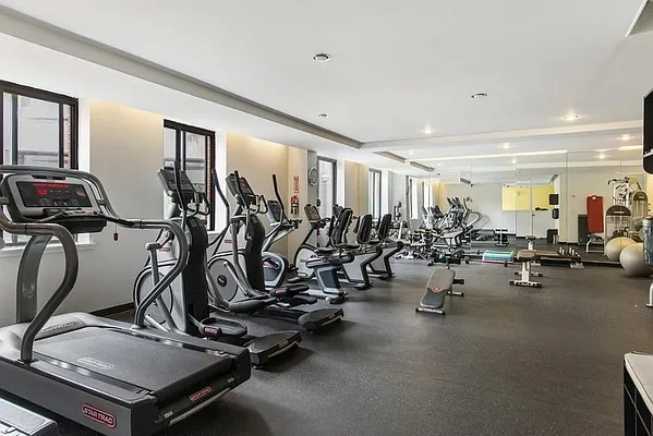 300 Rector Place, Unit 7F Manhattan, NY 10280 - Photo 7 of 10 a view of a room with gym equipment