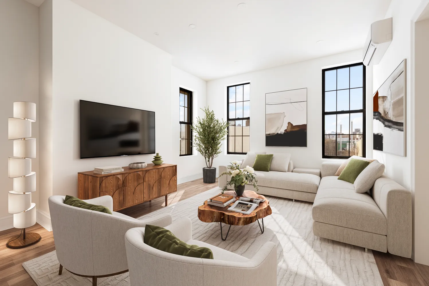 a living room with furniture and a flat screen tv