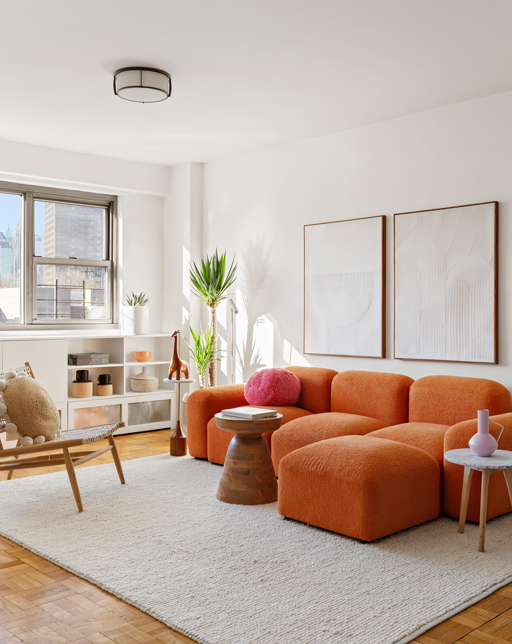 175 Adams Street, Unit 7A Brooklyn, NY 11201 - Photo 1 of 10 a living room with furniture and a window