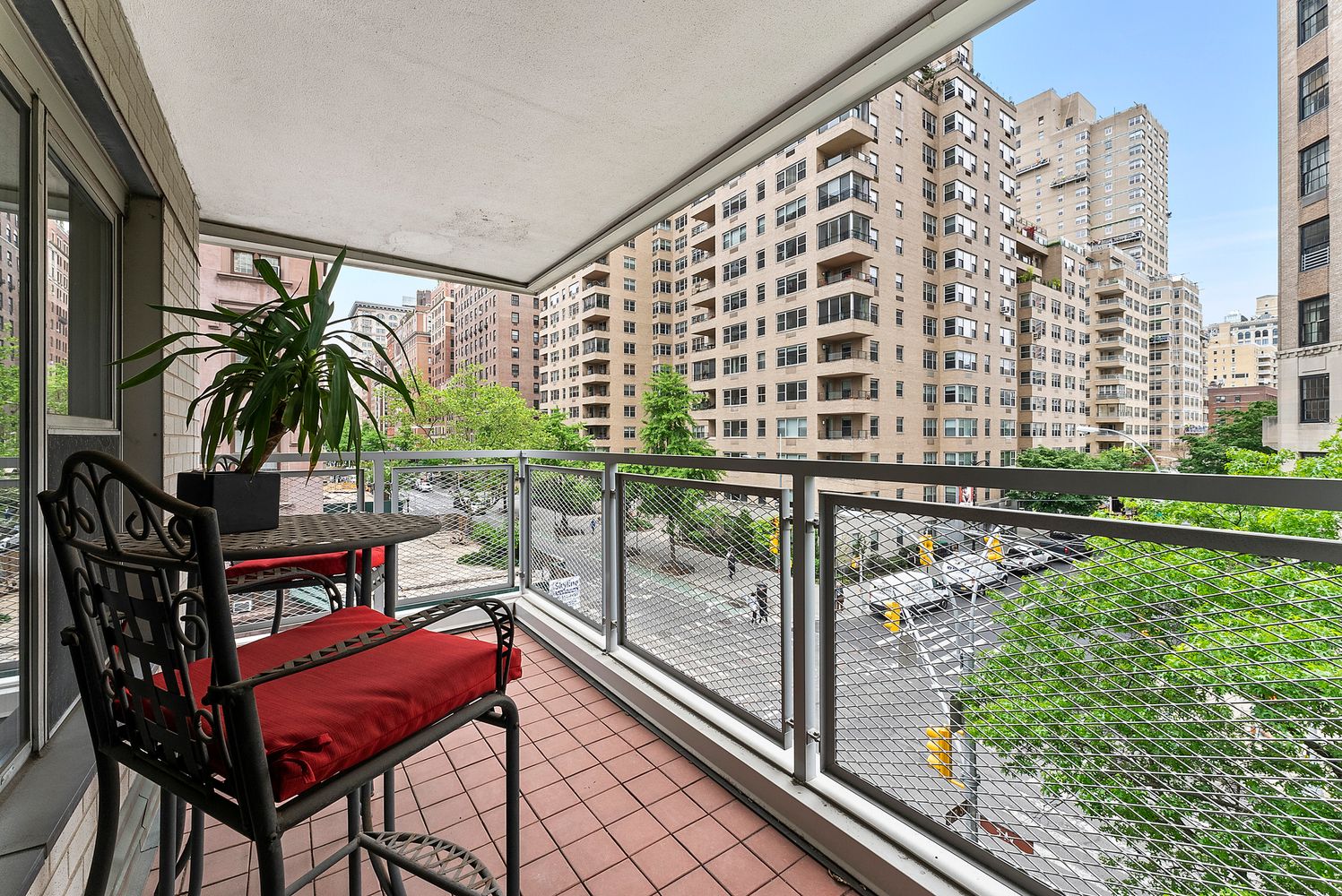 a view of balcony with outdoor seating