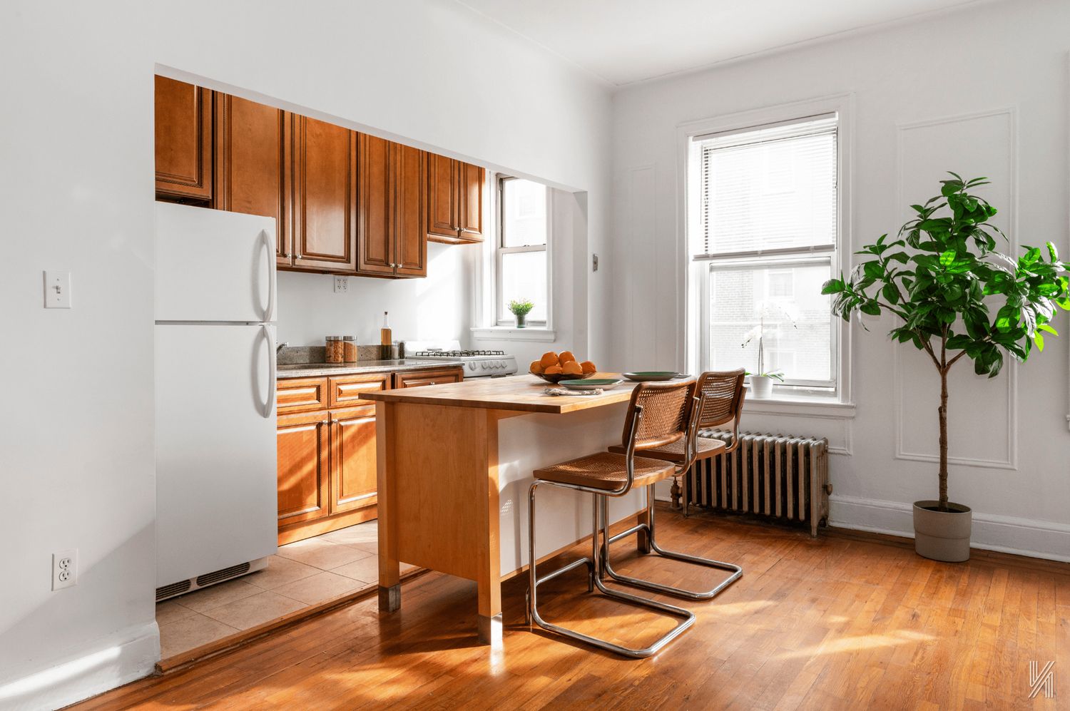 59-11 Queens Boulevard, Unit 3J Queens, NY 11377 - Photo 5 of 18 a dining room with furniture and window