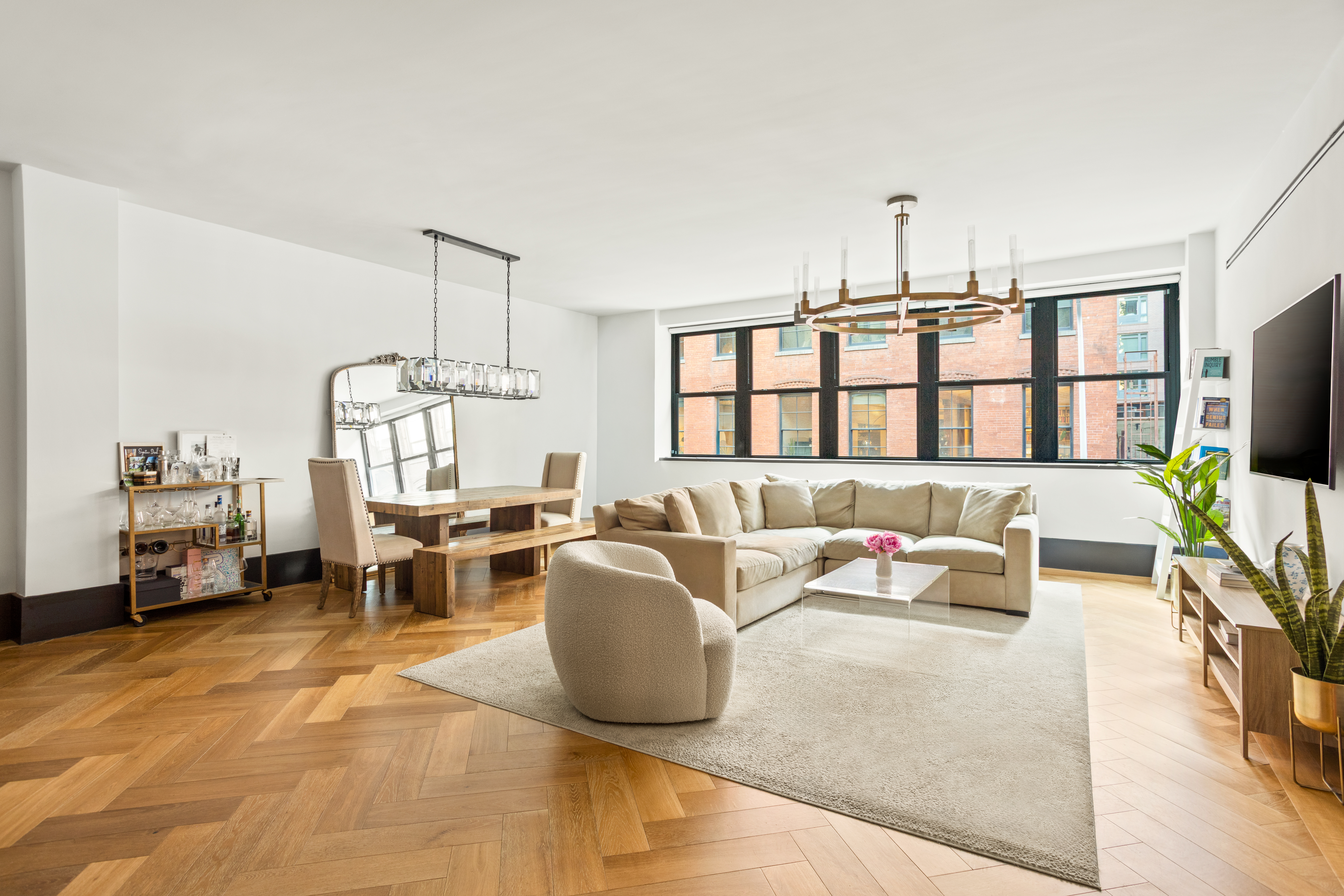 51 Jay Street, Unit 3I Brooklyn, NY 11201 - Photo 1 of 14 a living room with furniture and a table