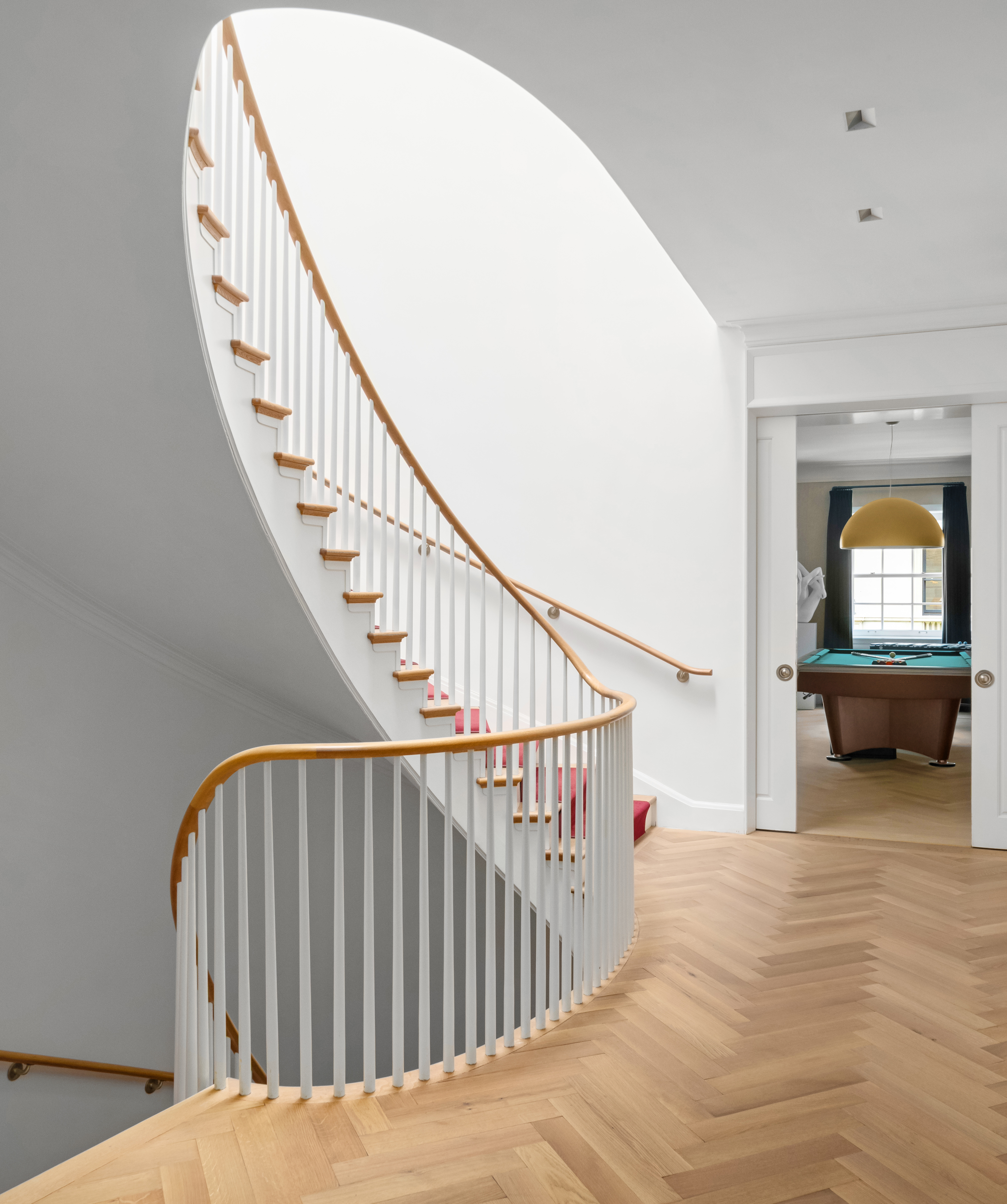 18 East 80th Street Manhattan, NY 10075 - Photo 16 of 28 a view of a hallway with wooden floor and stairs