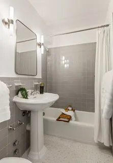 a bedroom with a bed and furniture