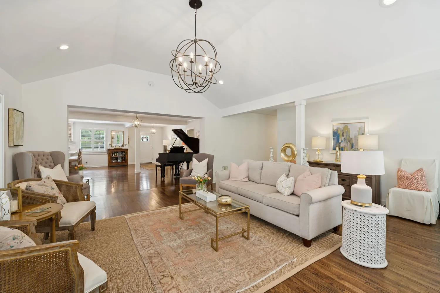 a living room with fireplace furniture and a flat screen tv