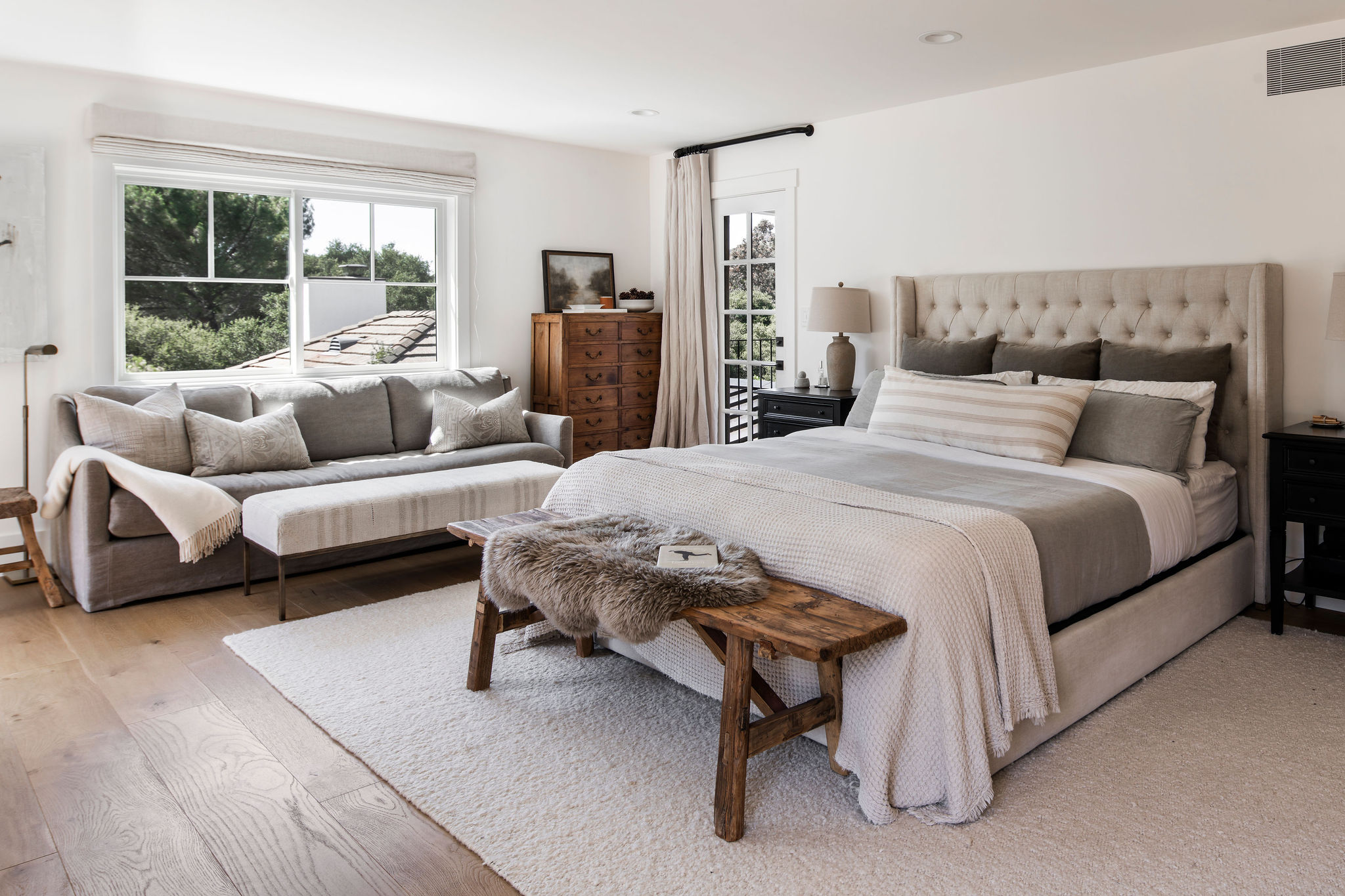 560 Cold Canyon Road Calabasas, CA 91302 - Photo 38 of 84 a bedroom with a bed and a couch