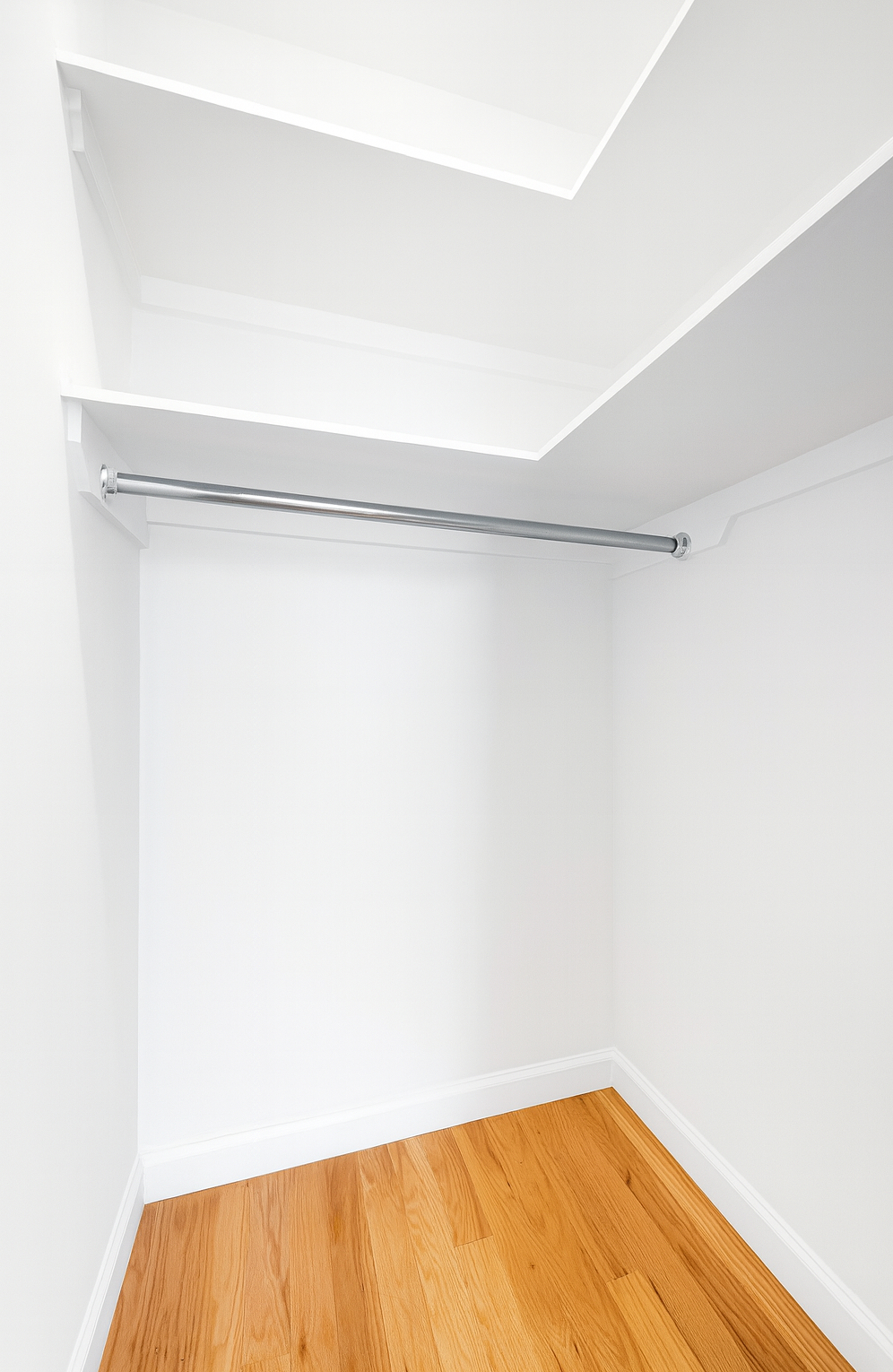 60 East 8th Street, Unit 15P Manhattan, NY 10003 - Photo 9 of 17 a view of a room with shelf