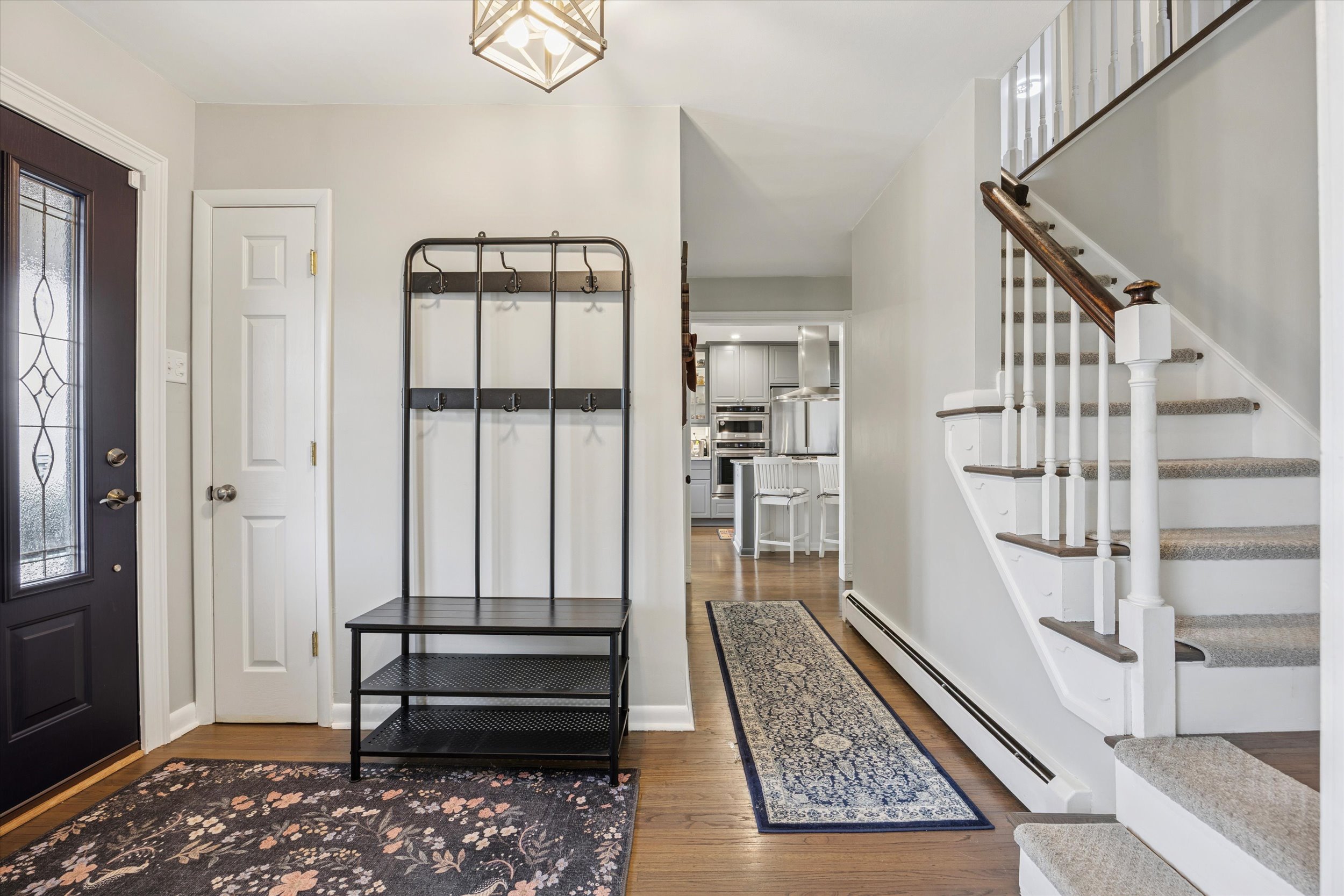 535 Bell Lane Ambler, PA 19002 - Photo 2 of 45 a view of staircase with white walls and a rug
