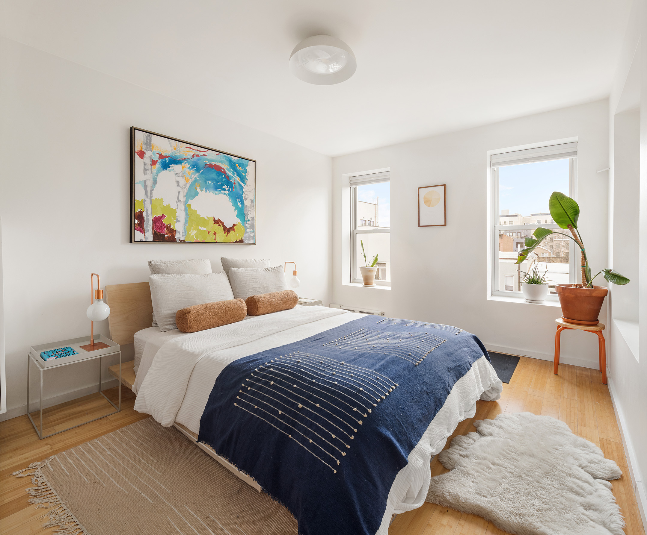 58 A Madison Street, Unit 2 Brooklyn, NY 11238 - Photo 11 of 12 a bedroom with a bed and a window