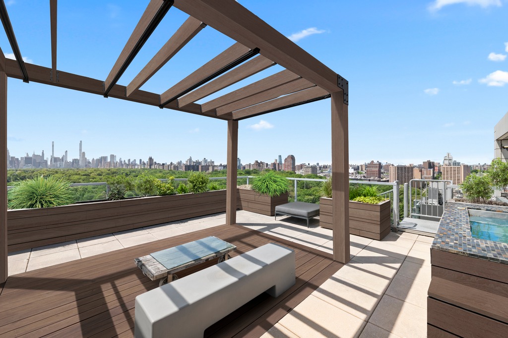 111 Central Park North, Unit PHB Manhattan, NY 10026 - Photo 10 of 17 a view of a floor to ceiling window with wooden floor