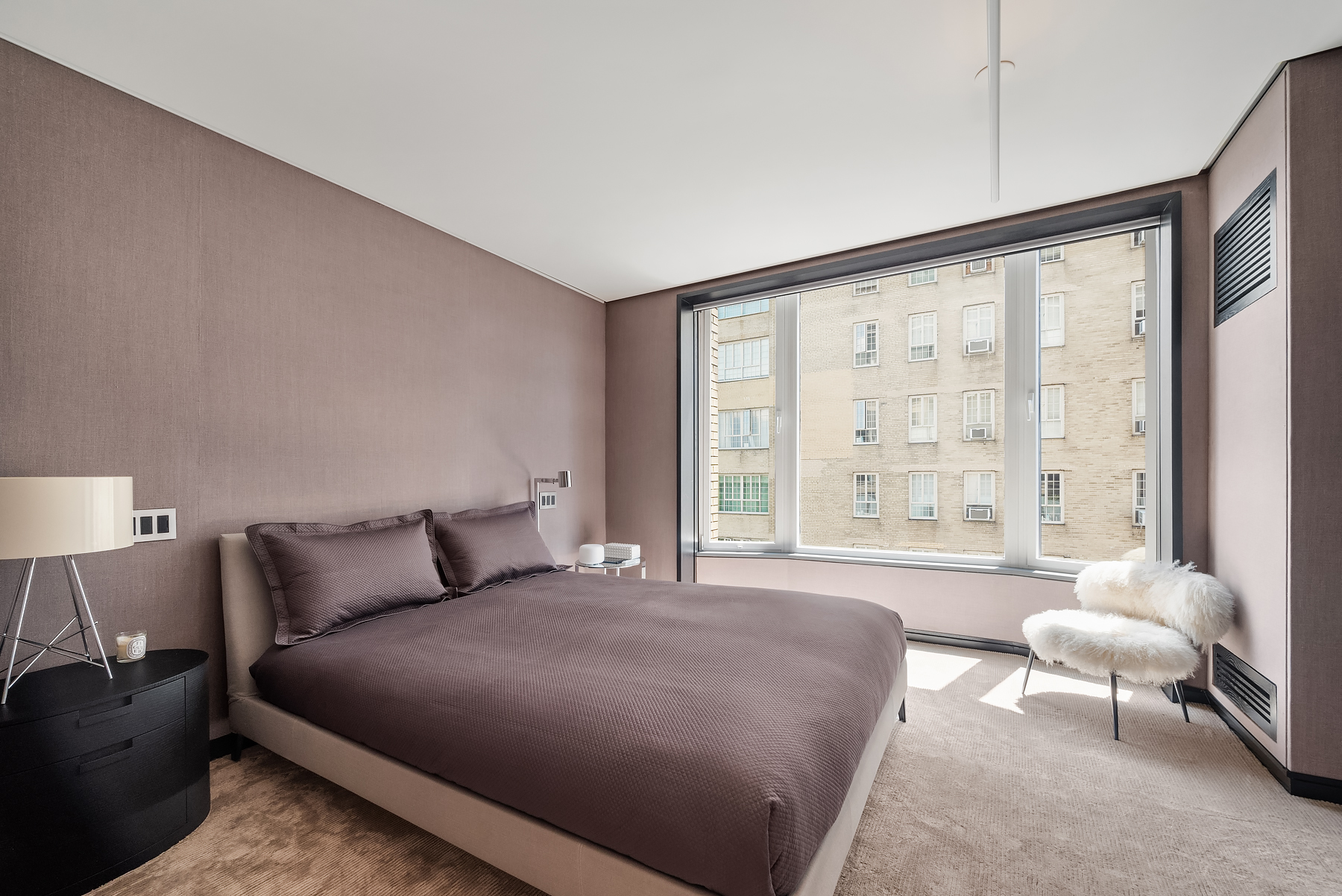 279 Central Park West, Unit 8B Manhattan, NY 10024 - Photo 7 of 15 a bedroom with a bed and a large window