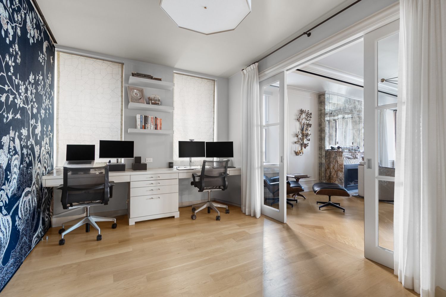 344 West 72nd Street, Unit 1008 Manhattan, NY 10023 - Photo 13 of 35 a view of a livingroom with workspace and a window