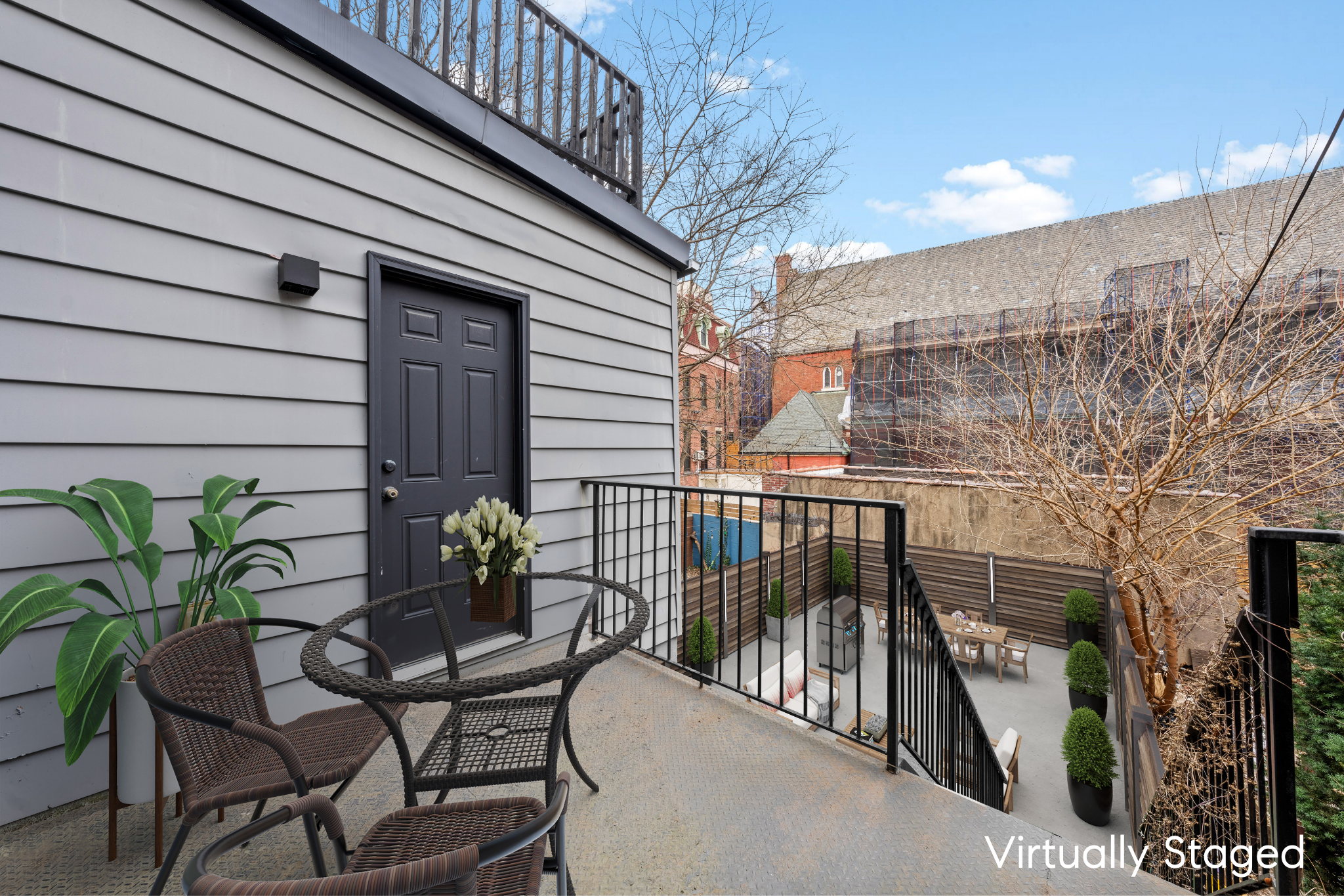 181 Park Avenue Brooklyn, NY 11205 - Photo 15 of 19 a view of balcony with two chairs and a potted plant