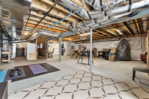 a view of a garage with wooden floors