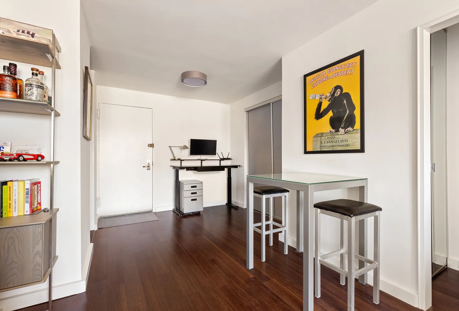 a view of kitchen and dining room with wooden floor