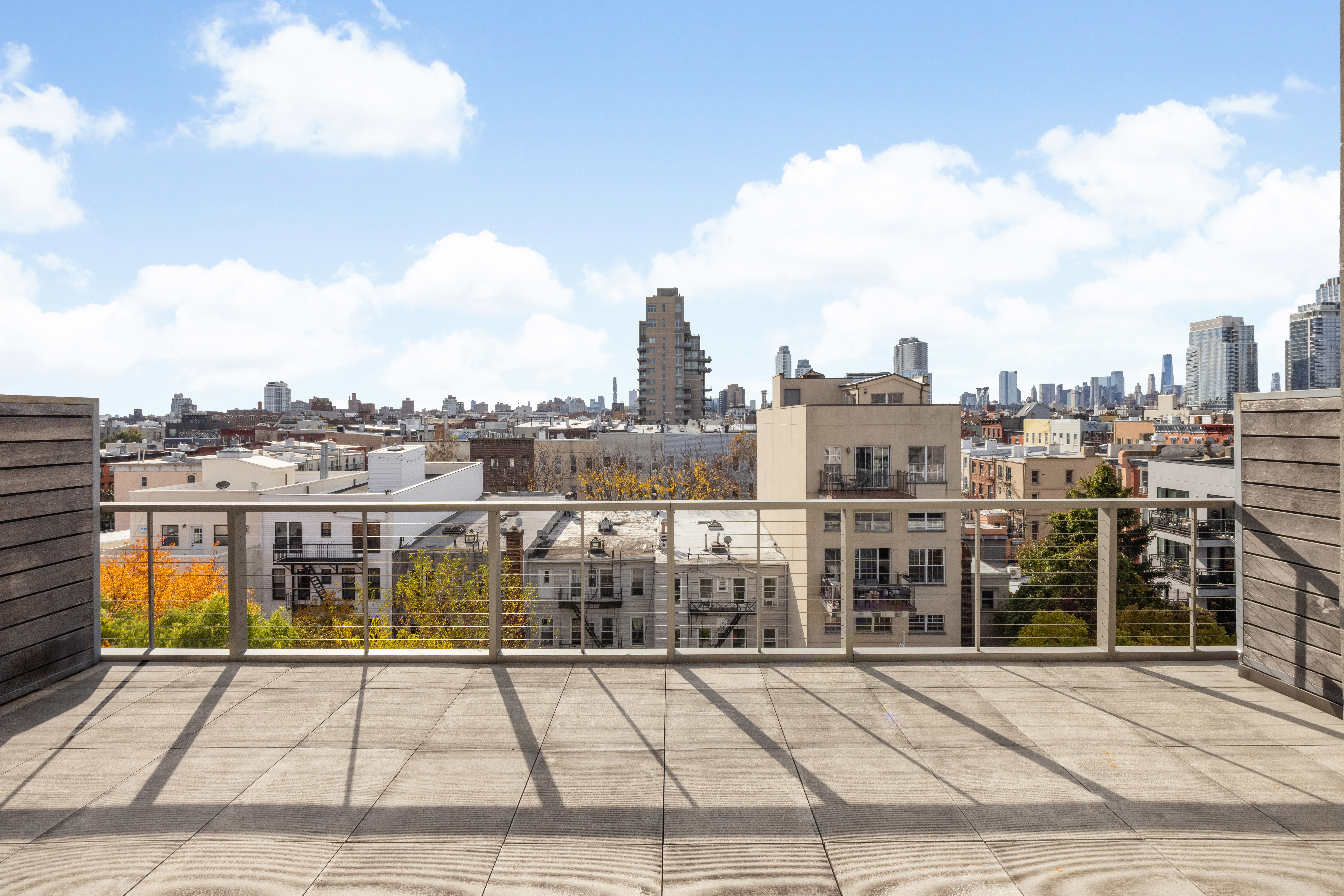 138 North 10th Street, Unit 302 Brooklyn, NY 11249 - Photo 14 of 15 a view of a city with tall buildings