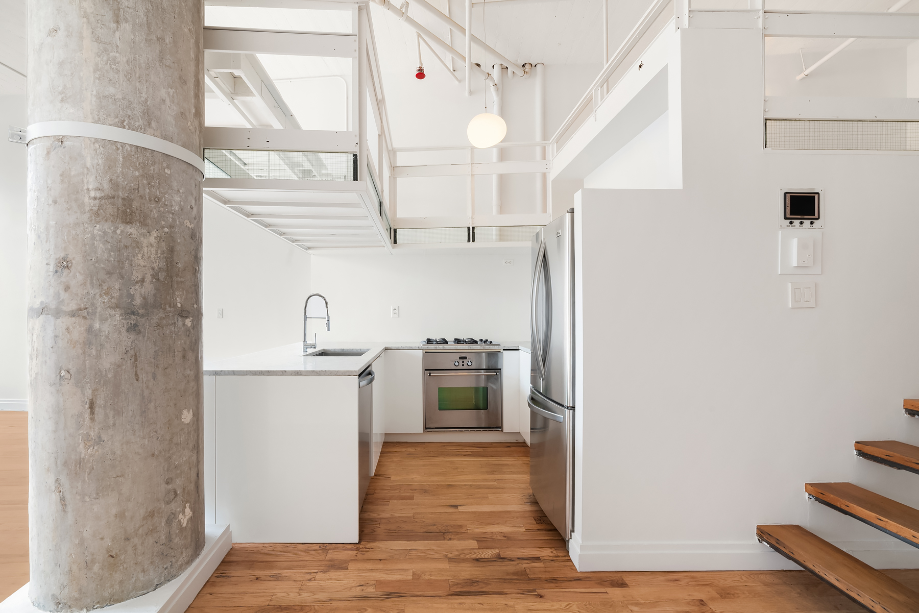689 Myrtle Avenue, Unit 4E Brooklyn, NY 11205 - Photo 3 of 21 a kitchen with a refrigerator and a stove