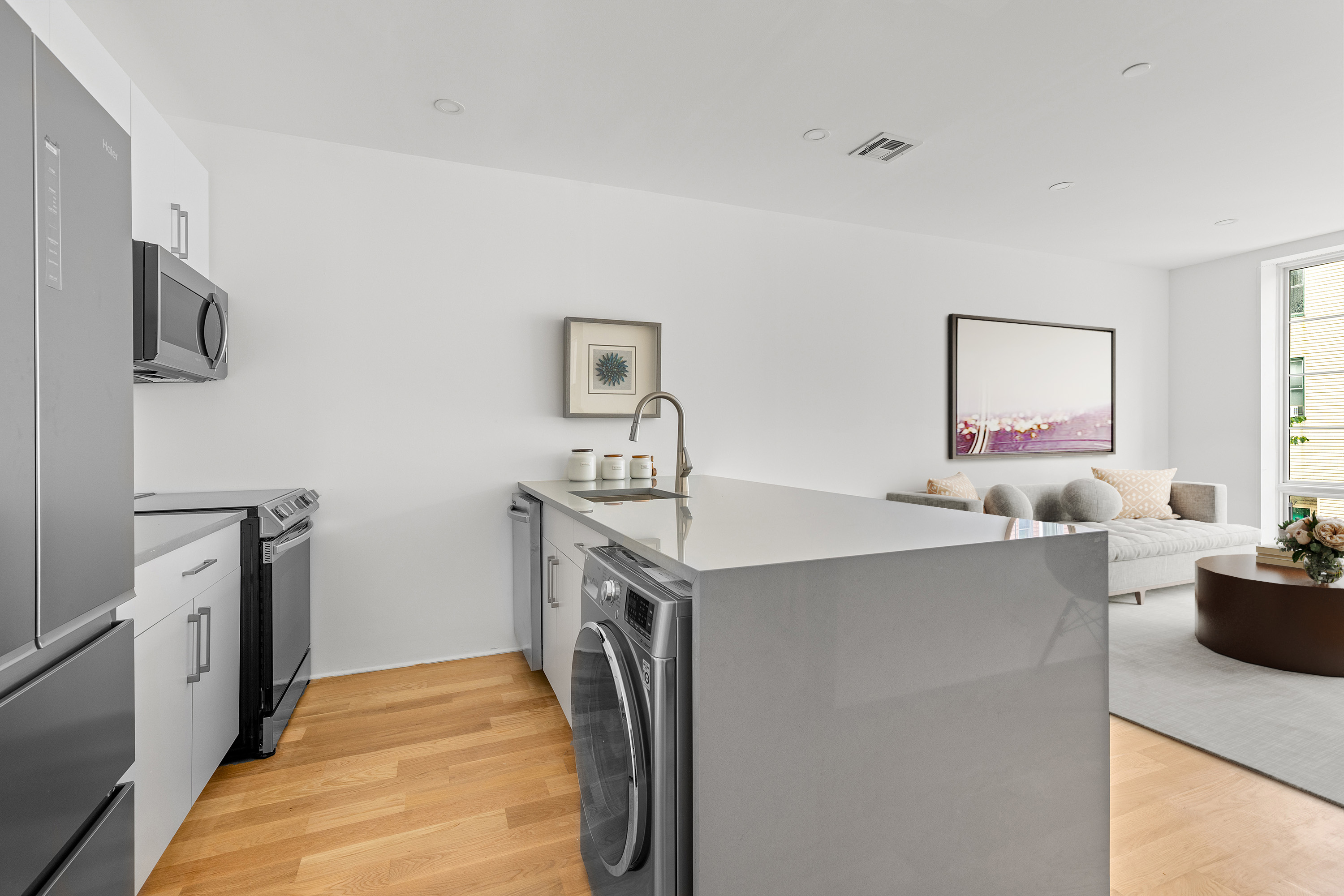 40 Schaefer Street, Unit 3B Brooklyn, NY 11207 - Photo 3 of 8 a bed room with a bed and a tv