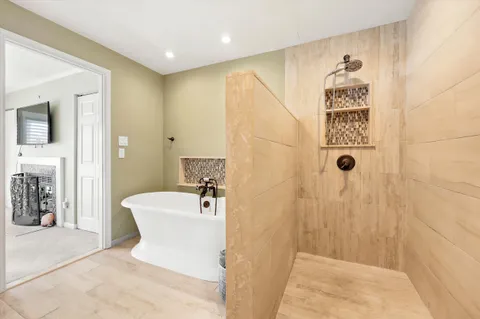 a spacious bathroom with a shower