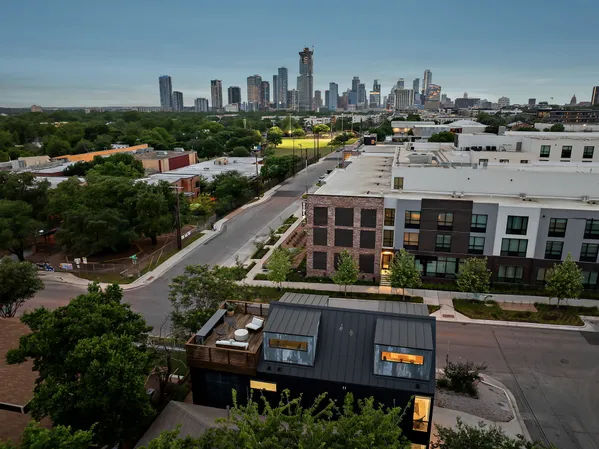 a view of a balcony with furniture