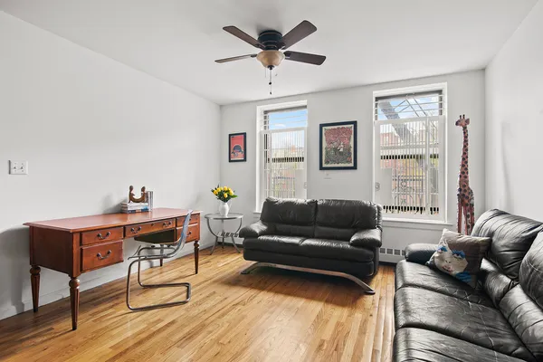 a living room with furniture and a window
