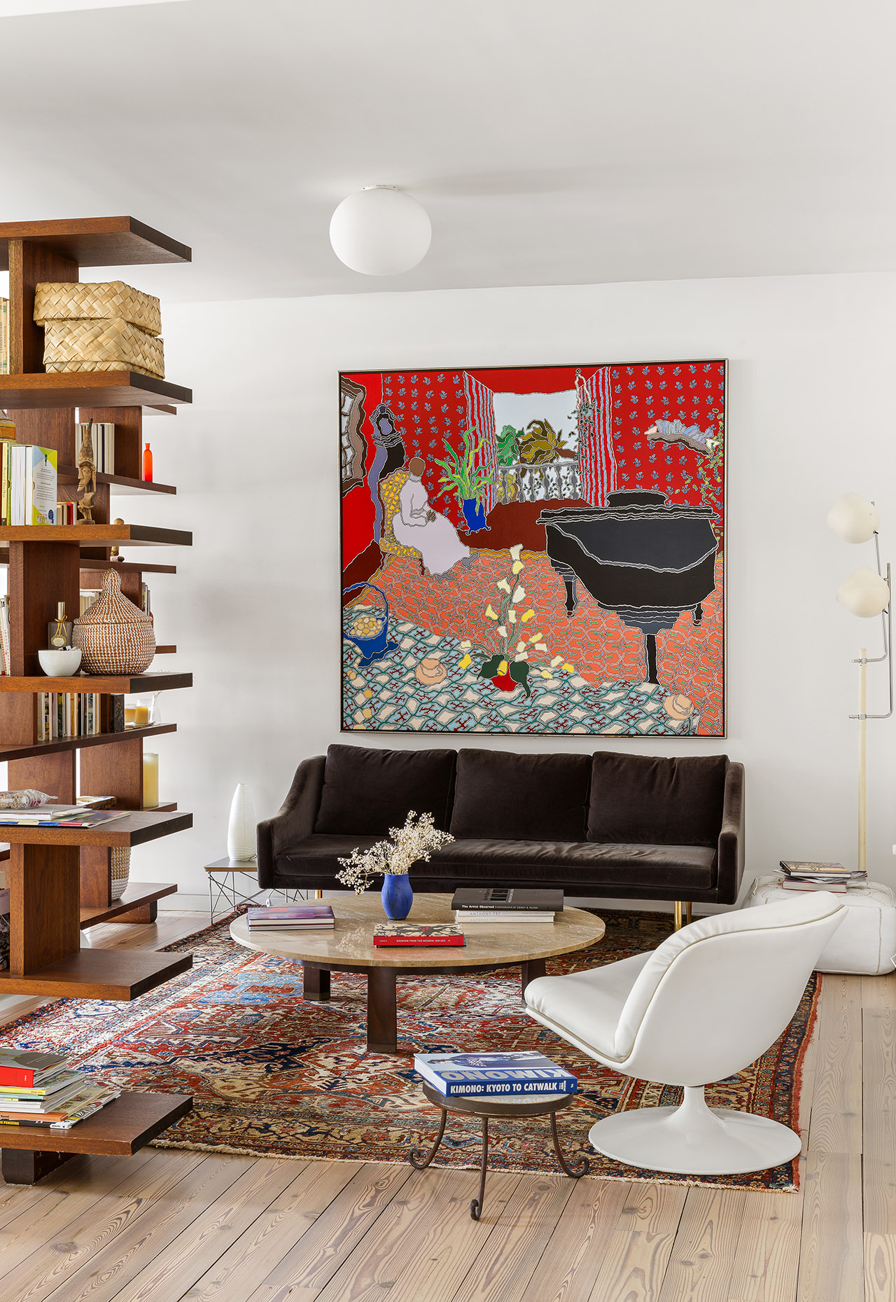 525 West 22nd Street, Unit 3AF Manhattan, NY 10011 - Photo 19 of 25 a living room with furniture and a flat screen tv