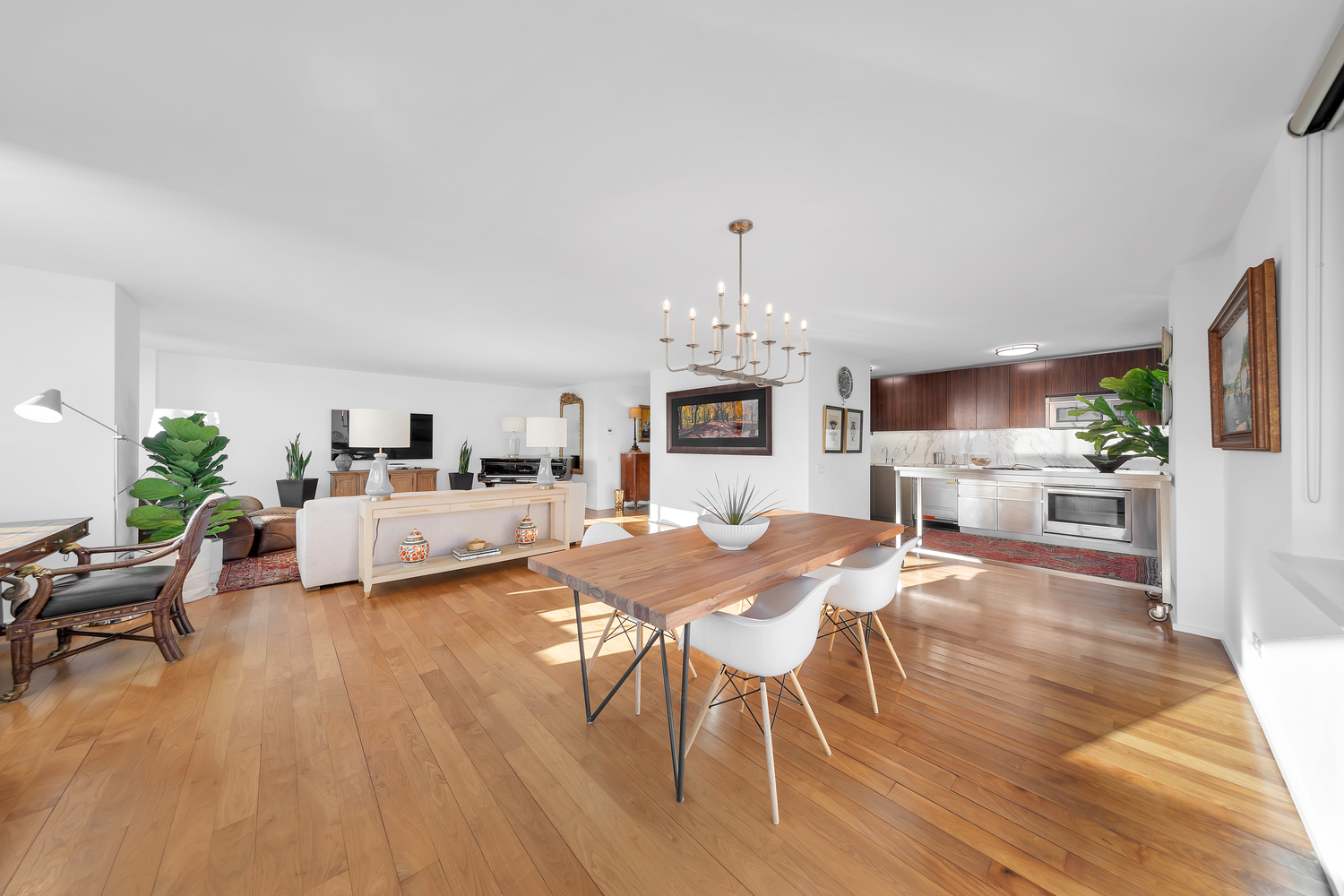 515 East 72nd Street, Unit 36B Manhattan, NY 10021 - Photo 4 of 36 a view of a dining room with furniture and wooden floor