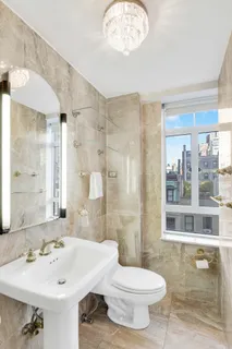 a bathroom with a sink and shower