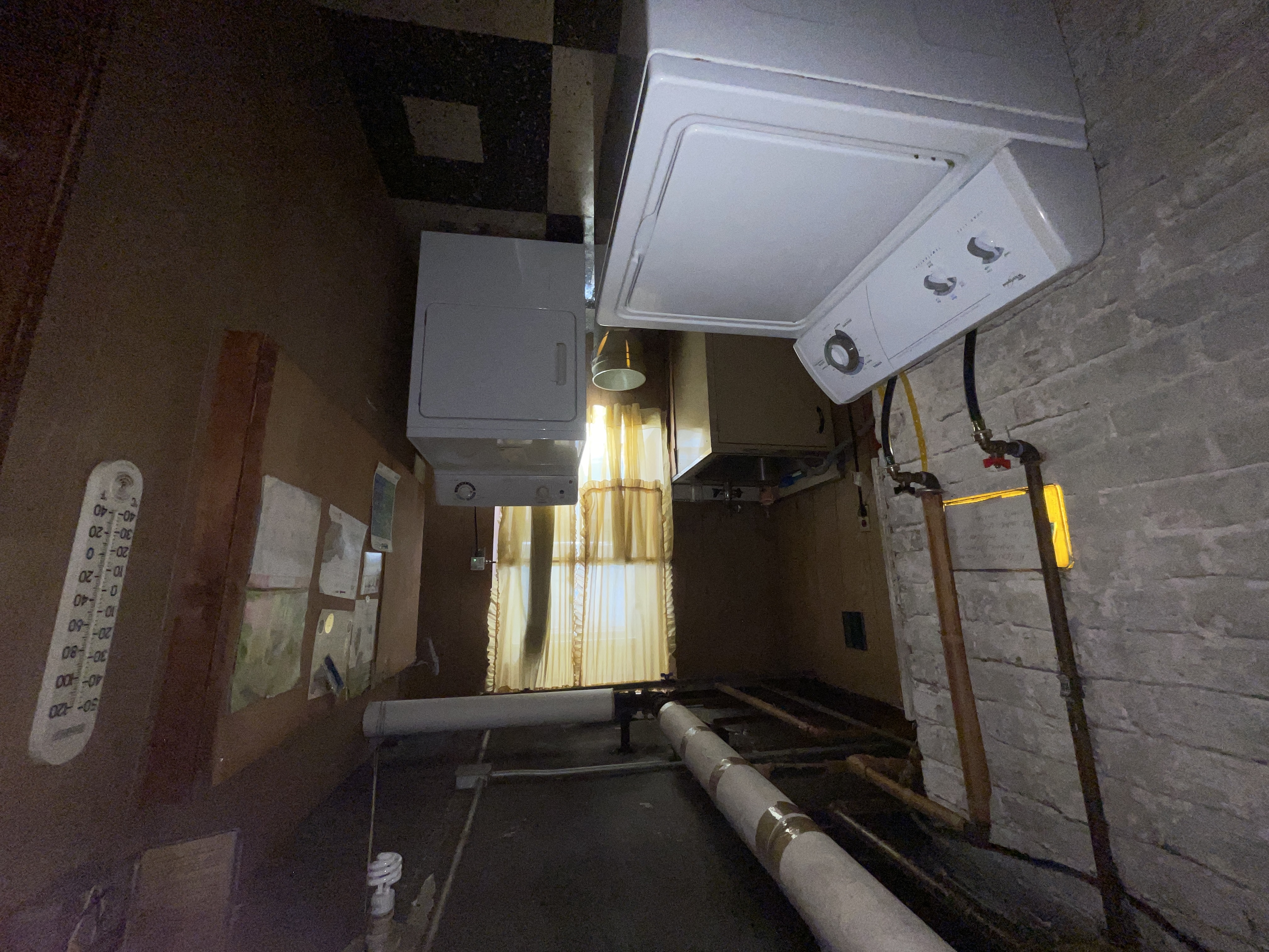 31-74 33rd Street Queens, NY 11106 - Photo 14 of 16 a utility room with dryer and washer