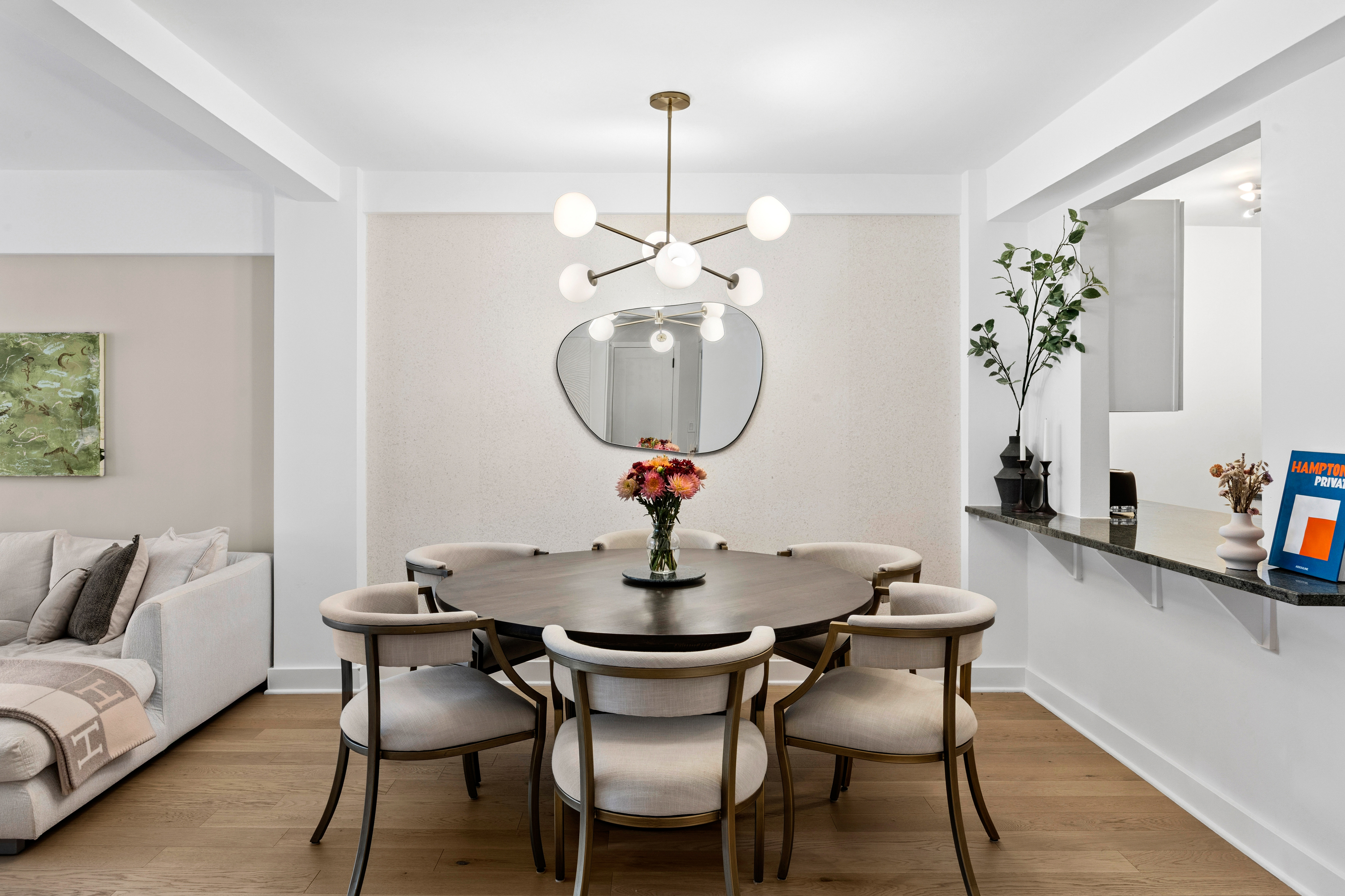 40 East 9th Street, Unit 7L Manhattan, NY 10003 - Photo 7 of 17 a dining room with furniture and wooden floor