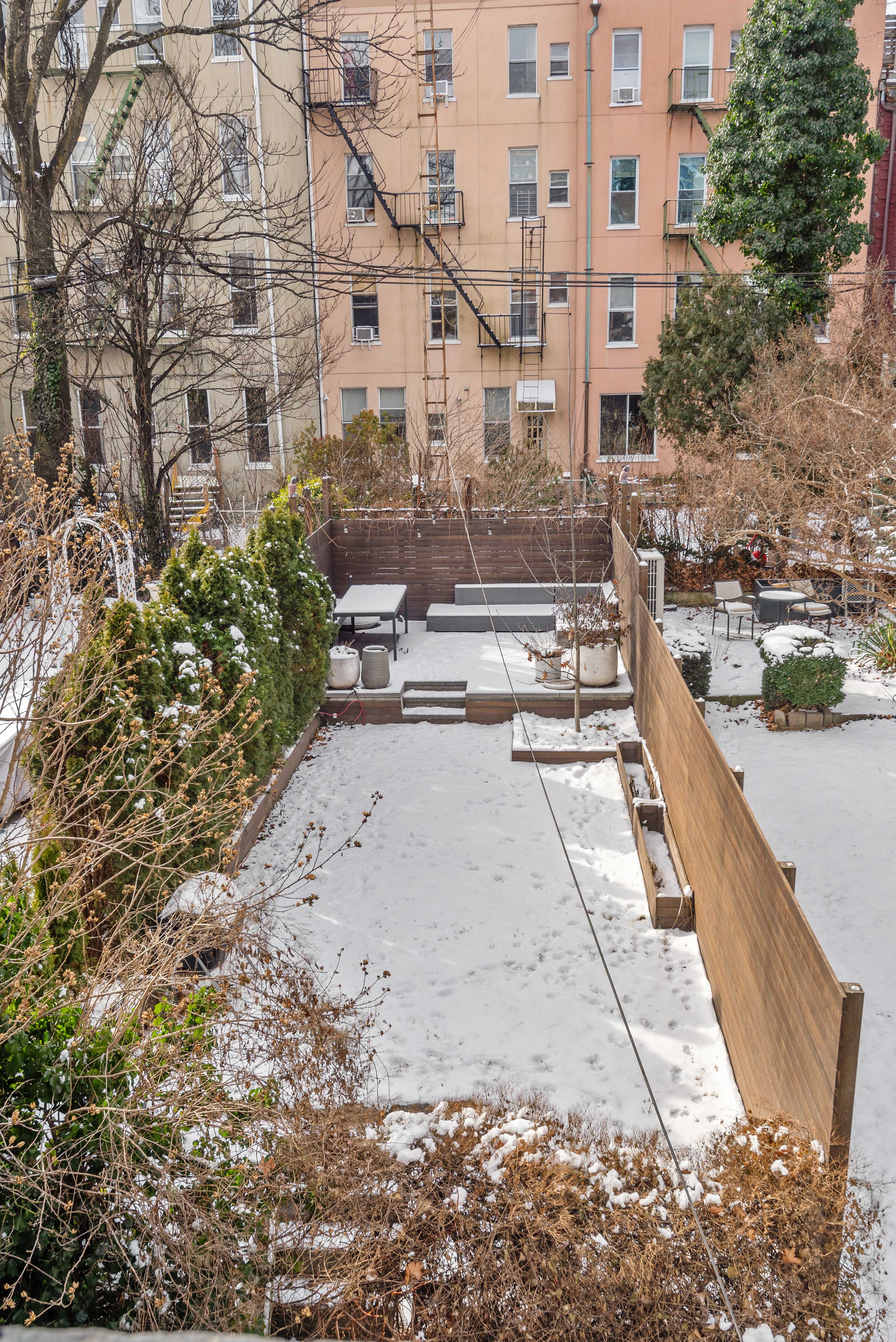 110 North 9th Street, Unit TH1 Brooklyn, NY 11249 - Photo 9 of 14 a view of residential houses with outdoor space and trees