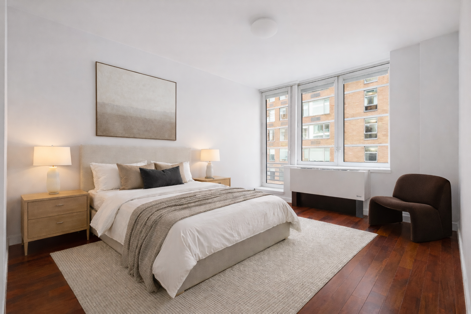 125 West 21st Street, Unit 5B Manhattan, NY 10011 - Photo 7 of 15 a bedroom with bed and a large window