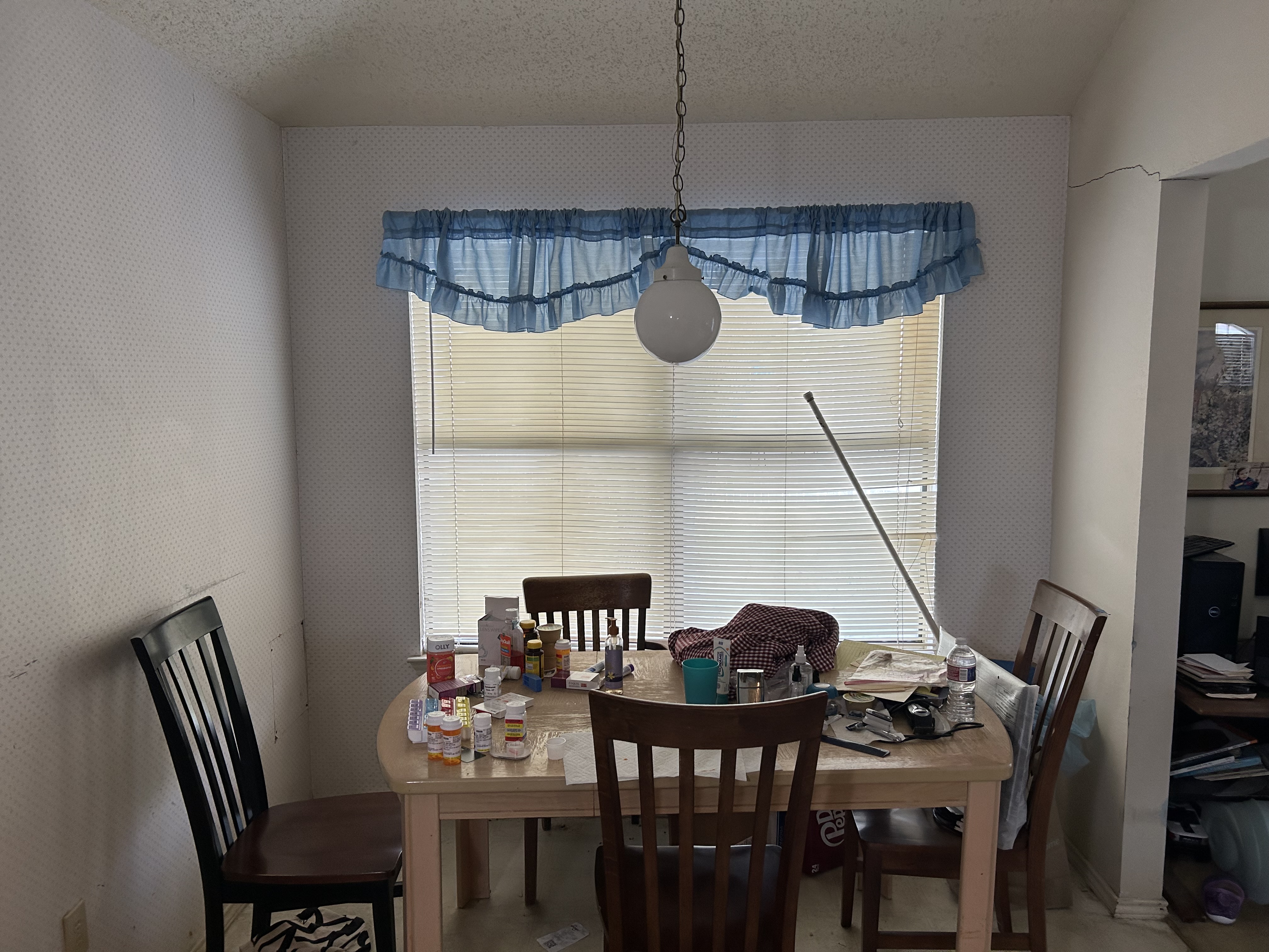408 Rose Drive Allen, TX 75002 - Photo 6 of 11 a view of a dining room with furniture and chandelier