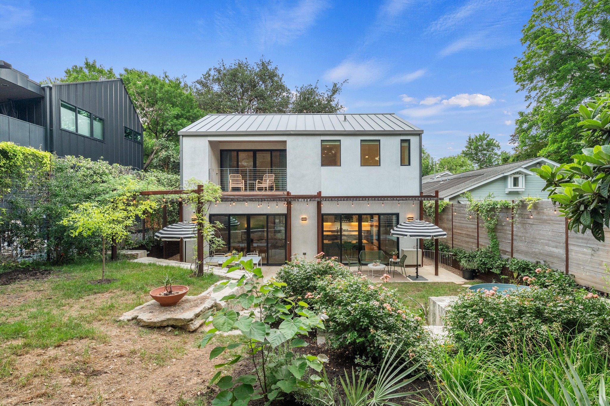 1206 Bickler Road Austin, TX 78704 - Photo 55 of 65 a front view of a house with garden