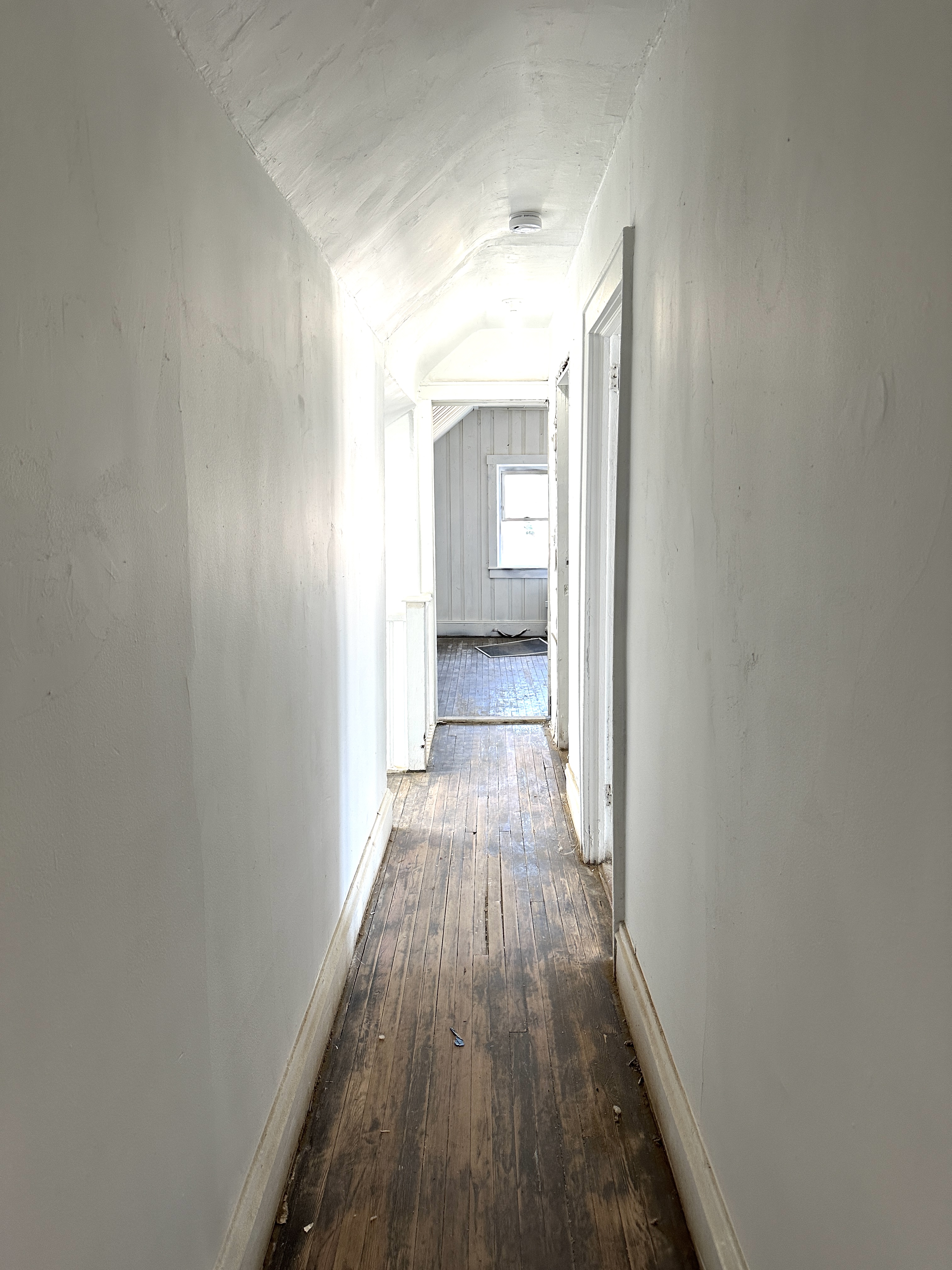 92-64 Springfield Boulevard Queens, NY 11428 - Photo 19 of 25 a view of a hallway with wooden floor