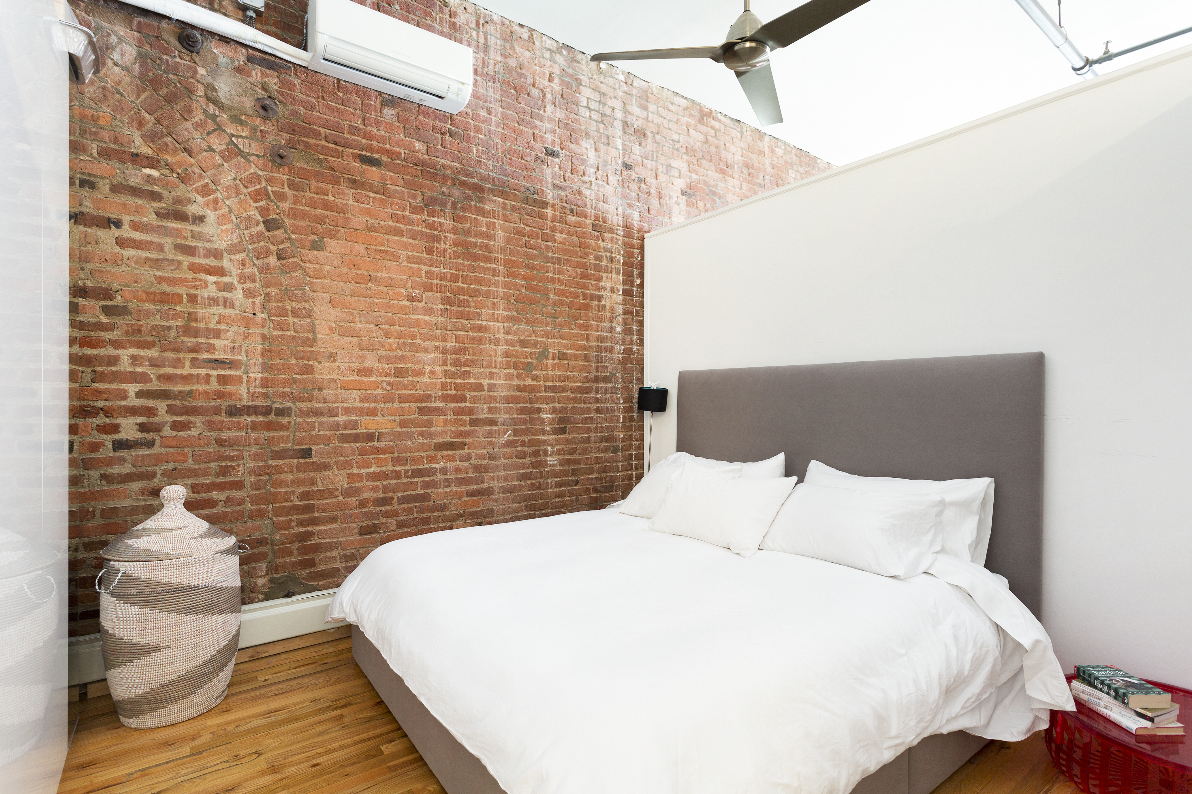 272 Water Street, Unit 5F Manhattan, NY 10038 - Photo 8 of 12 a bathroom with a bathtub and shower